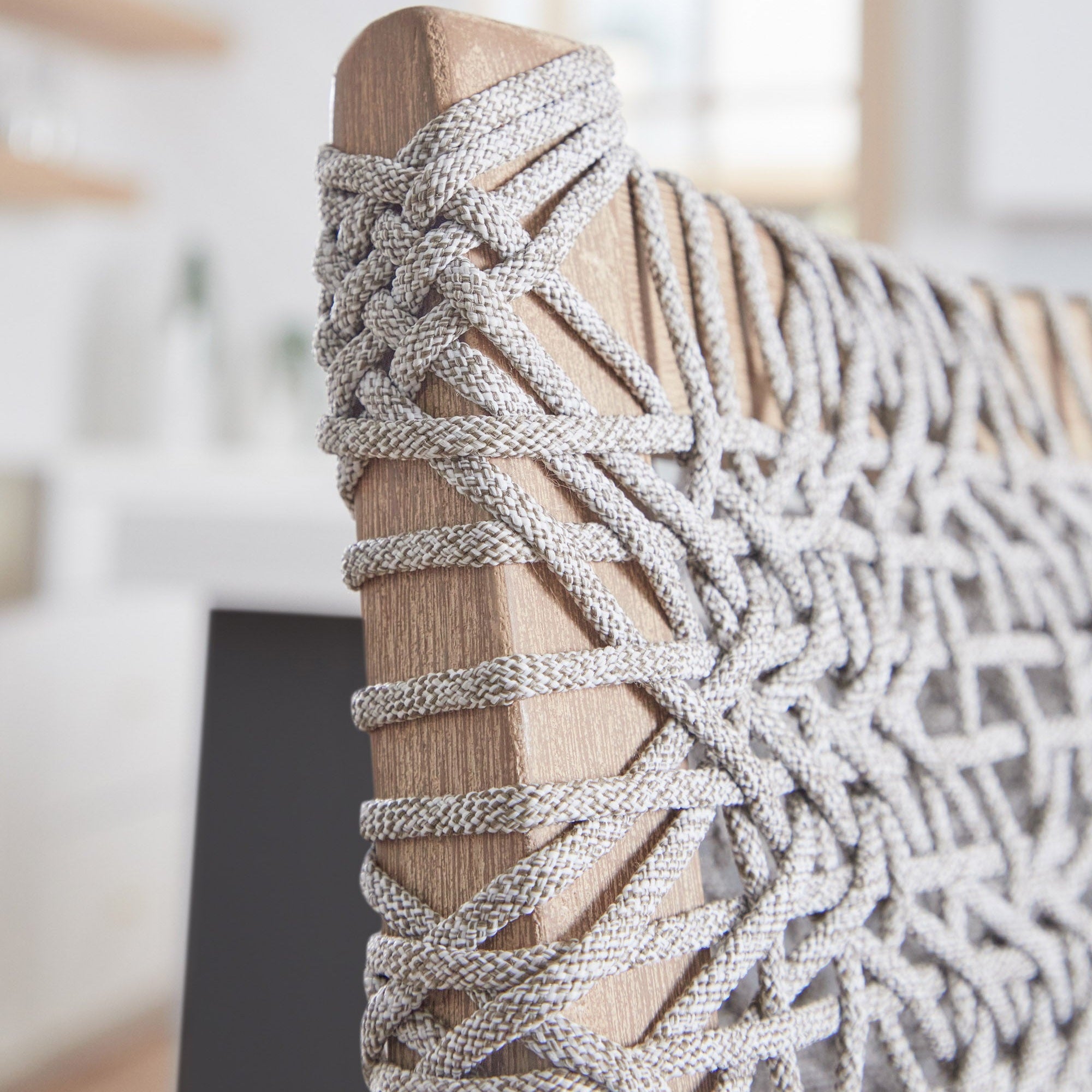 Close-up of Costa Counter Stool showing tightly woven taupe polypropylene rope on distressed gray mahogany frame