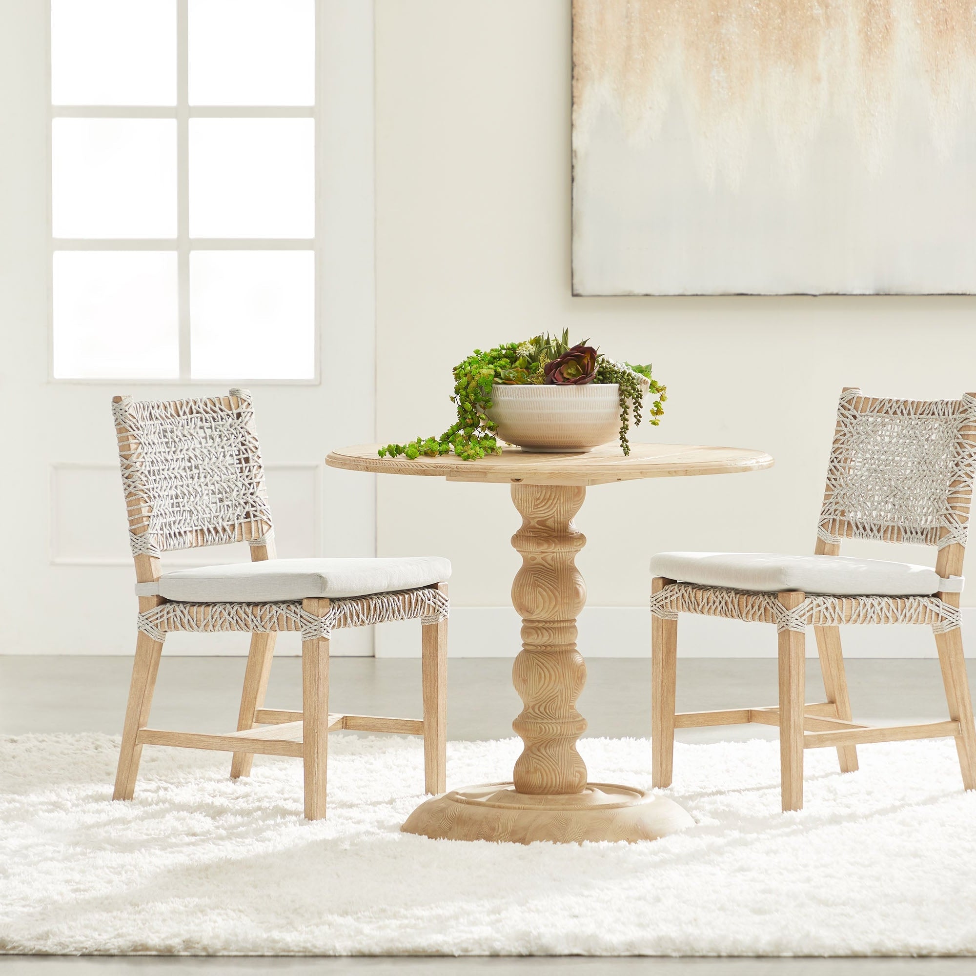 Set of two Essentials For Living Costa Dining Chairs with white and taupe woven seats and pumice cushions