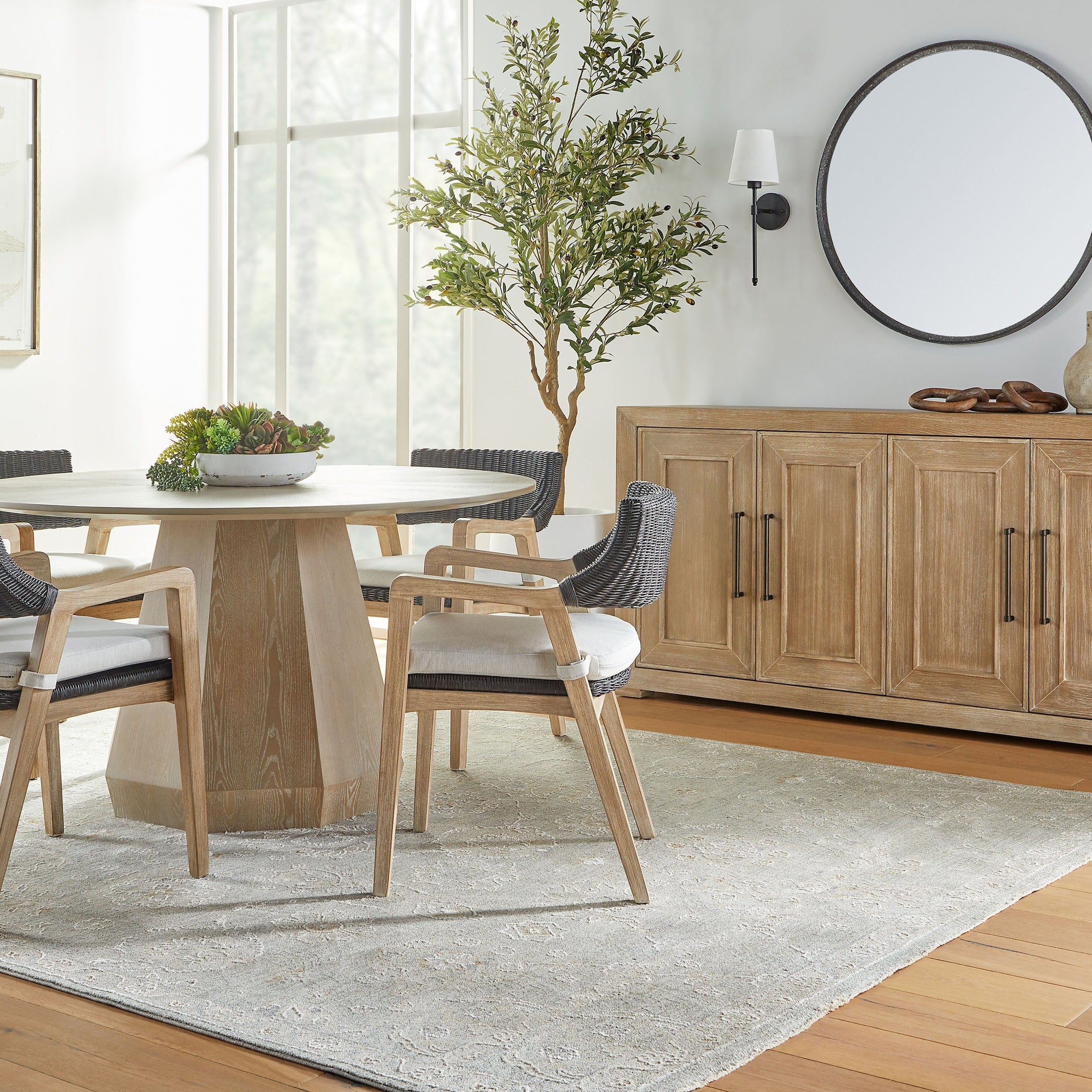 Essentials For Living Coulter 54 round dining table with octagon pedestal and natural gray ash wood finish in modern dining room