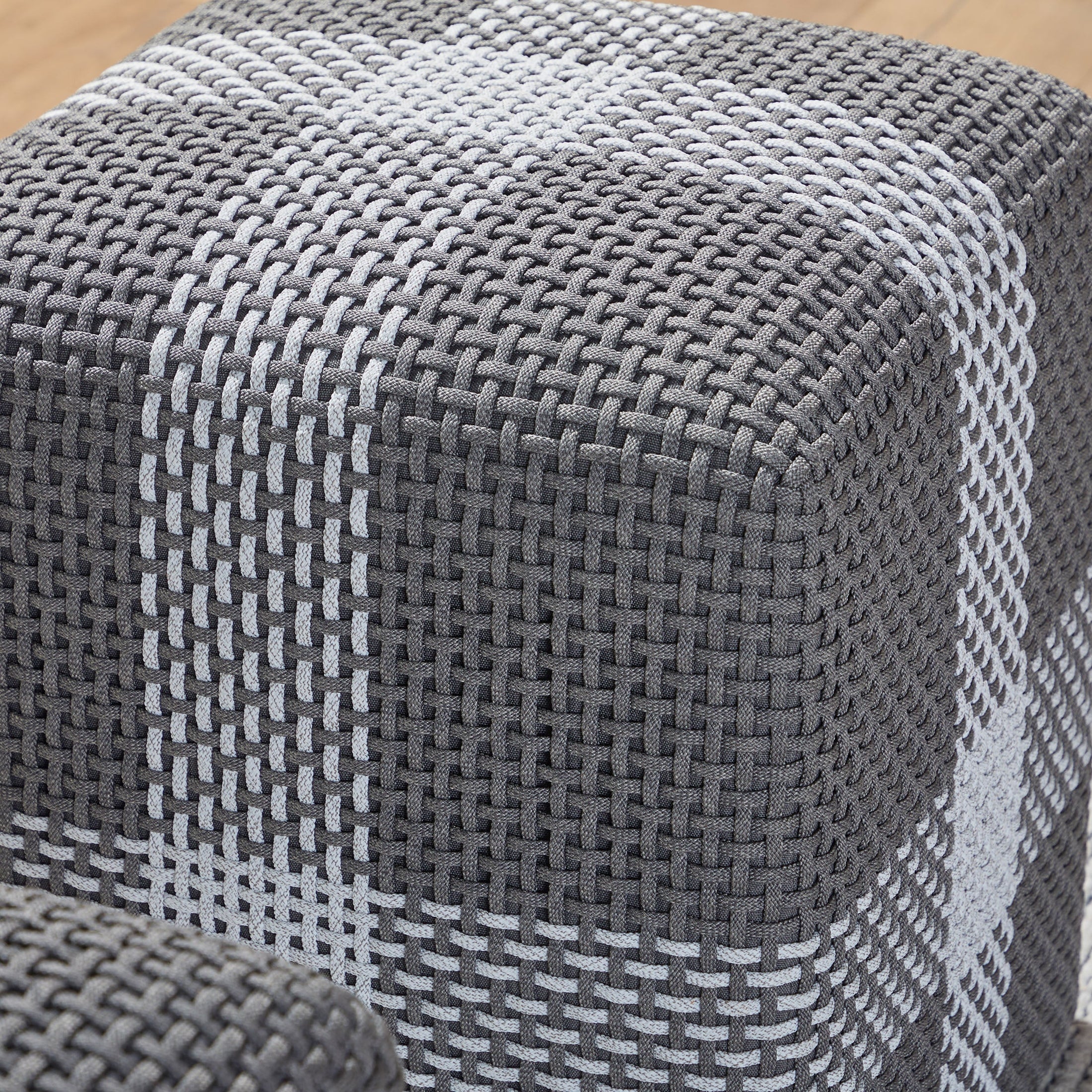 Close-up of Essentials for Living Cross Accent Cube featuring taupe and white woven rope with teak wood frame detail