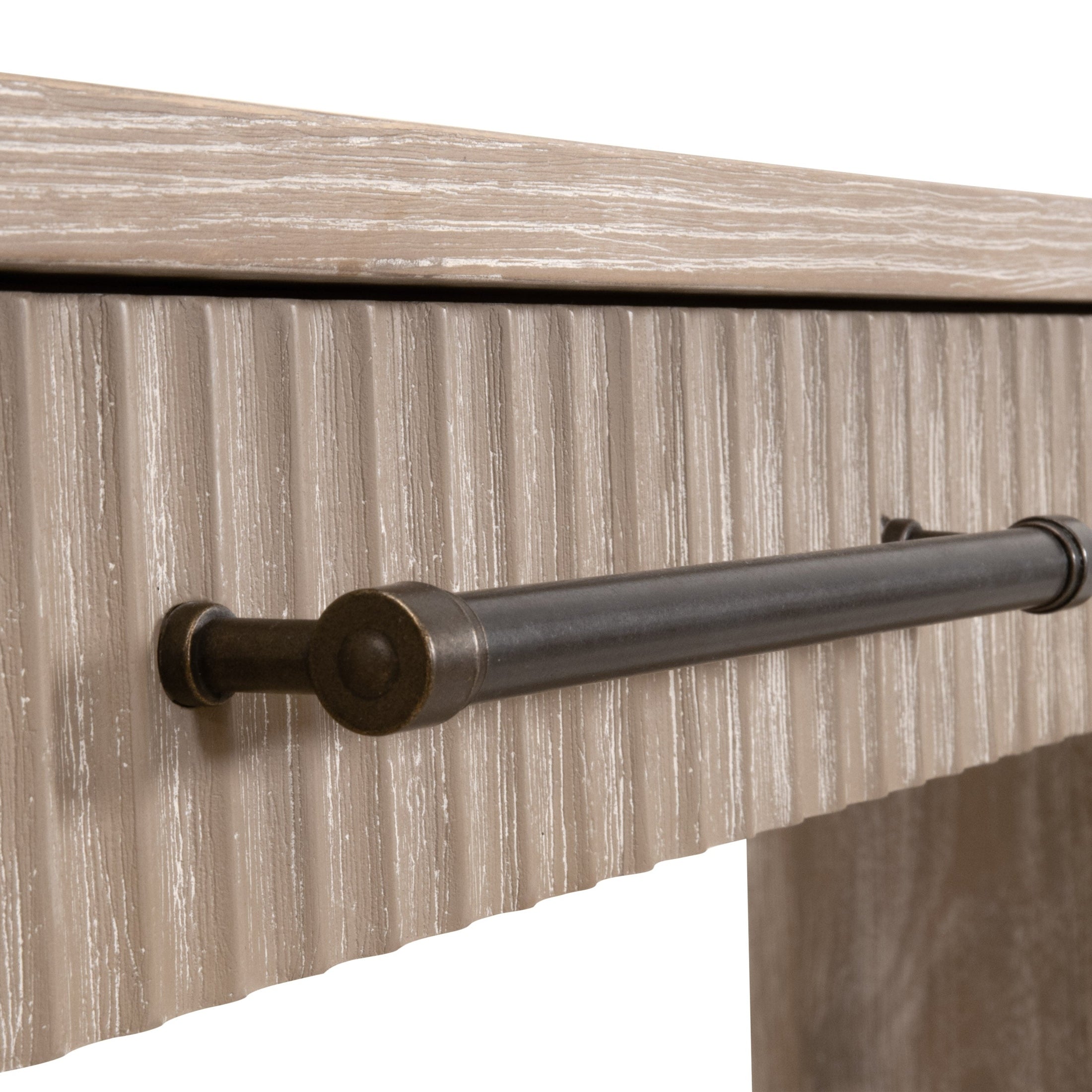 Close-up of textured reeded drawer front and antique bronze handle on Halloway 2-Drawer Console Table by Essentials For Living