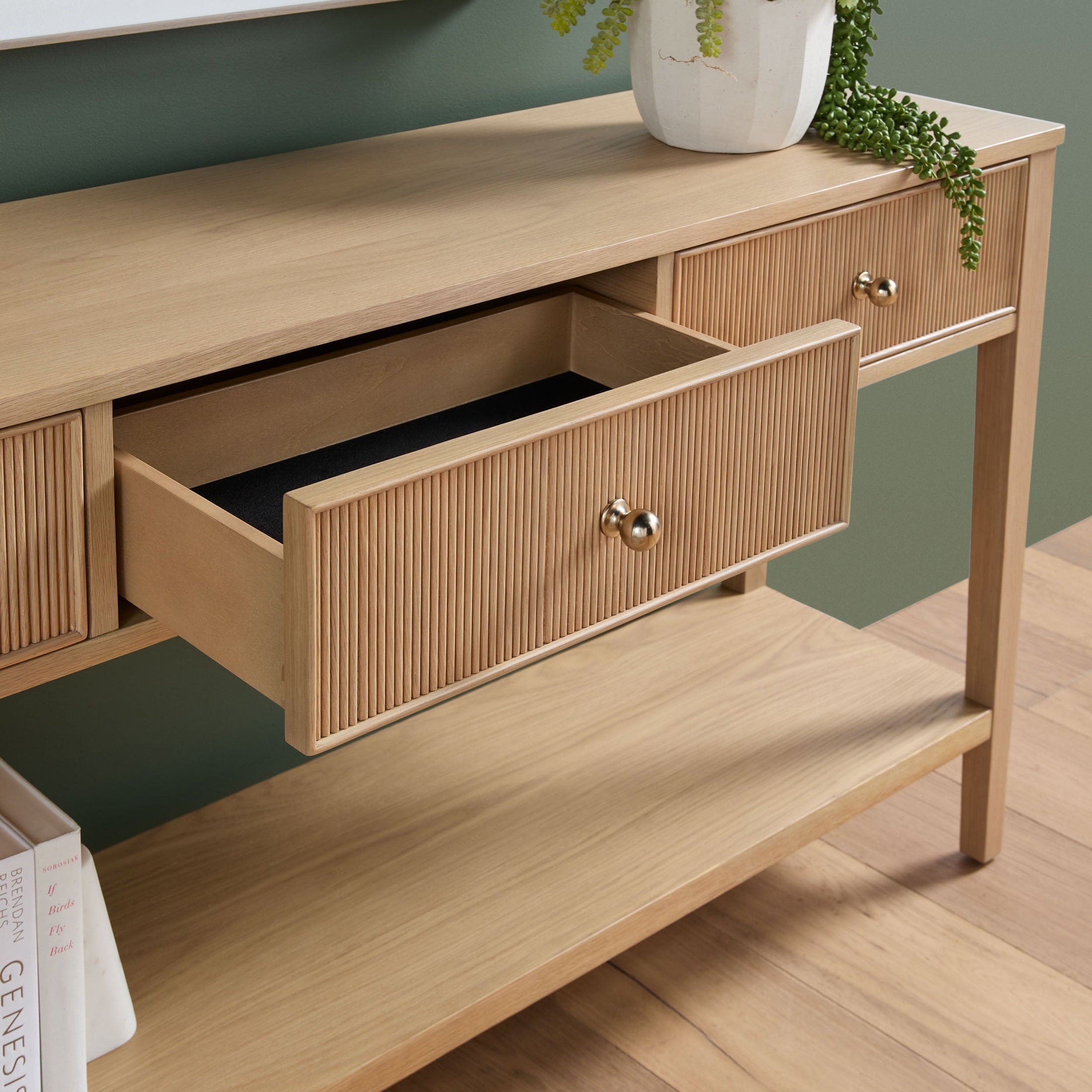 Highland 3-Drawer Console Table in natural oak with fluted drawers and brass knobs by Essentials for Living.