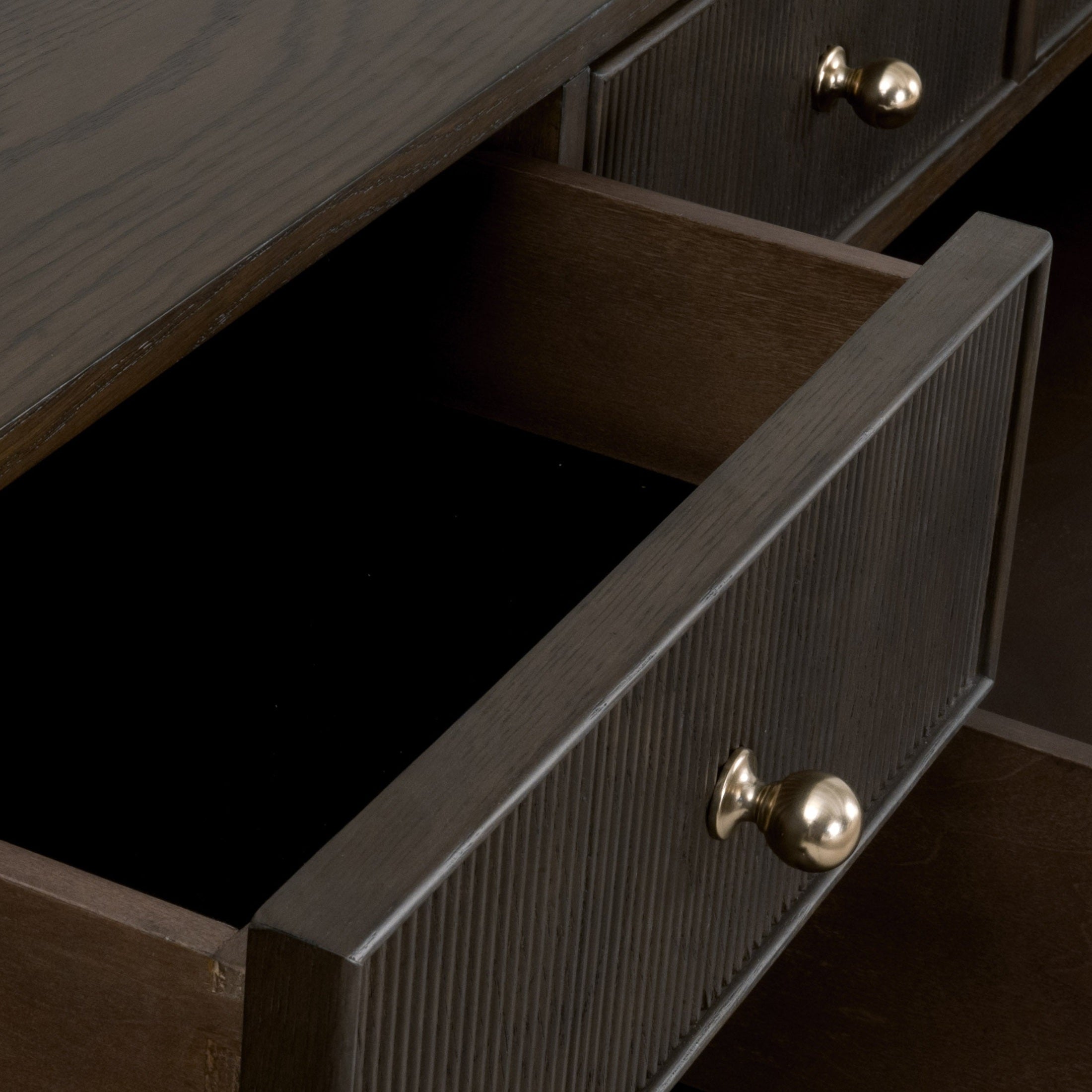 Open drawer of Highland 8-Drawer Double Dresser showing fluted wood front and polished brass knob by Essentials for Living