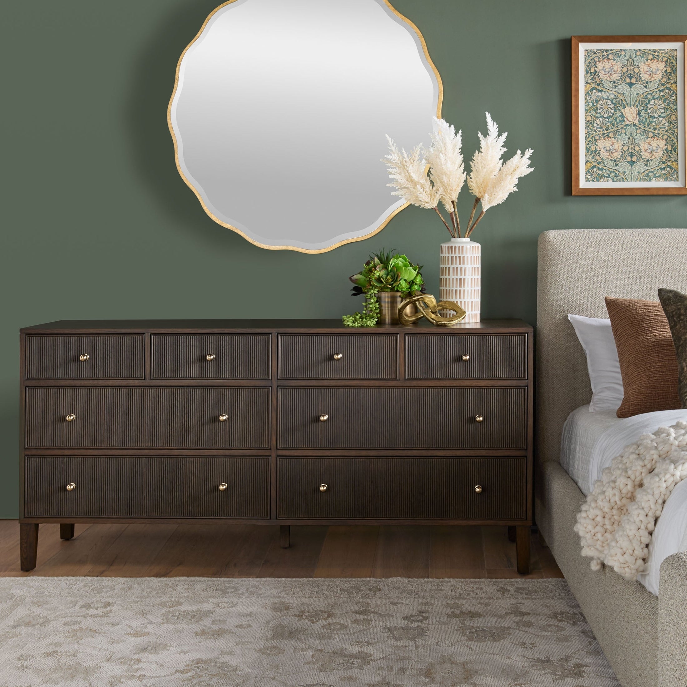 Essentials for Living Highland 8-drawer double dresser in dark oak with brass knobs in a modern bedroom setting