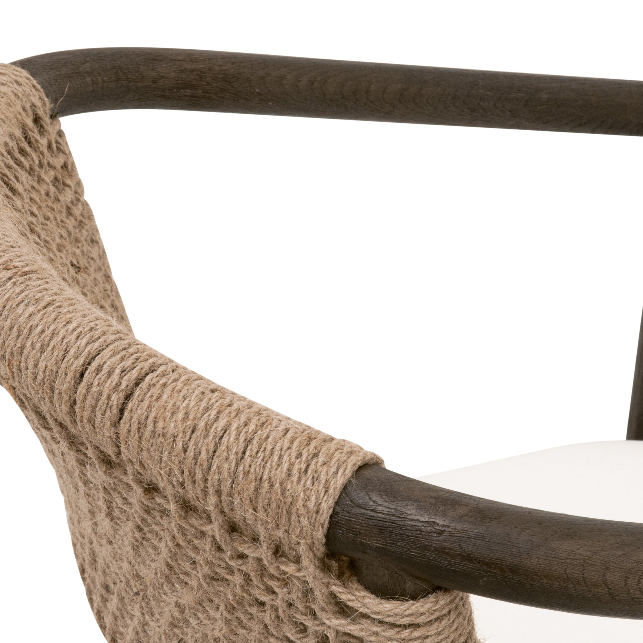 Close-up of Juxtaposition Accent Chair with matte brown oak frame and handwoven jute back by Essentials for Living