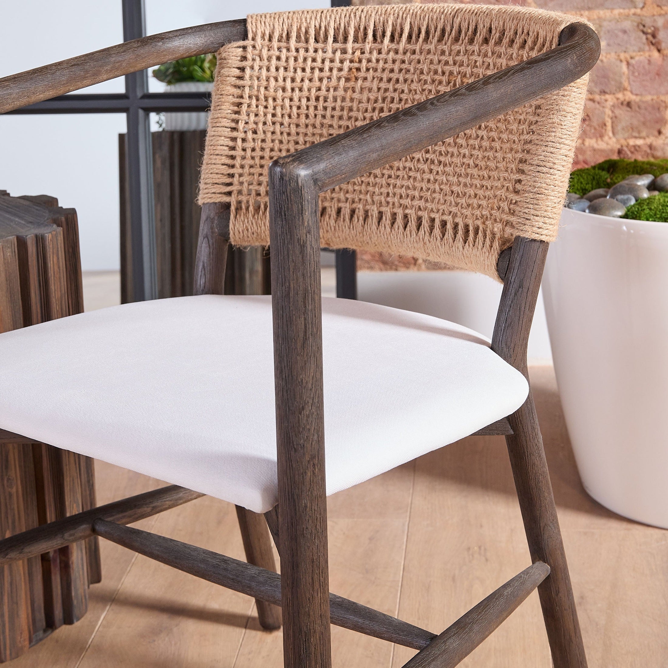 Juxtaposition Accent Chair with matte brown oak frame, jute twine backrest, white fabric seat by Essentials for Living