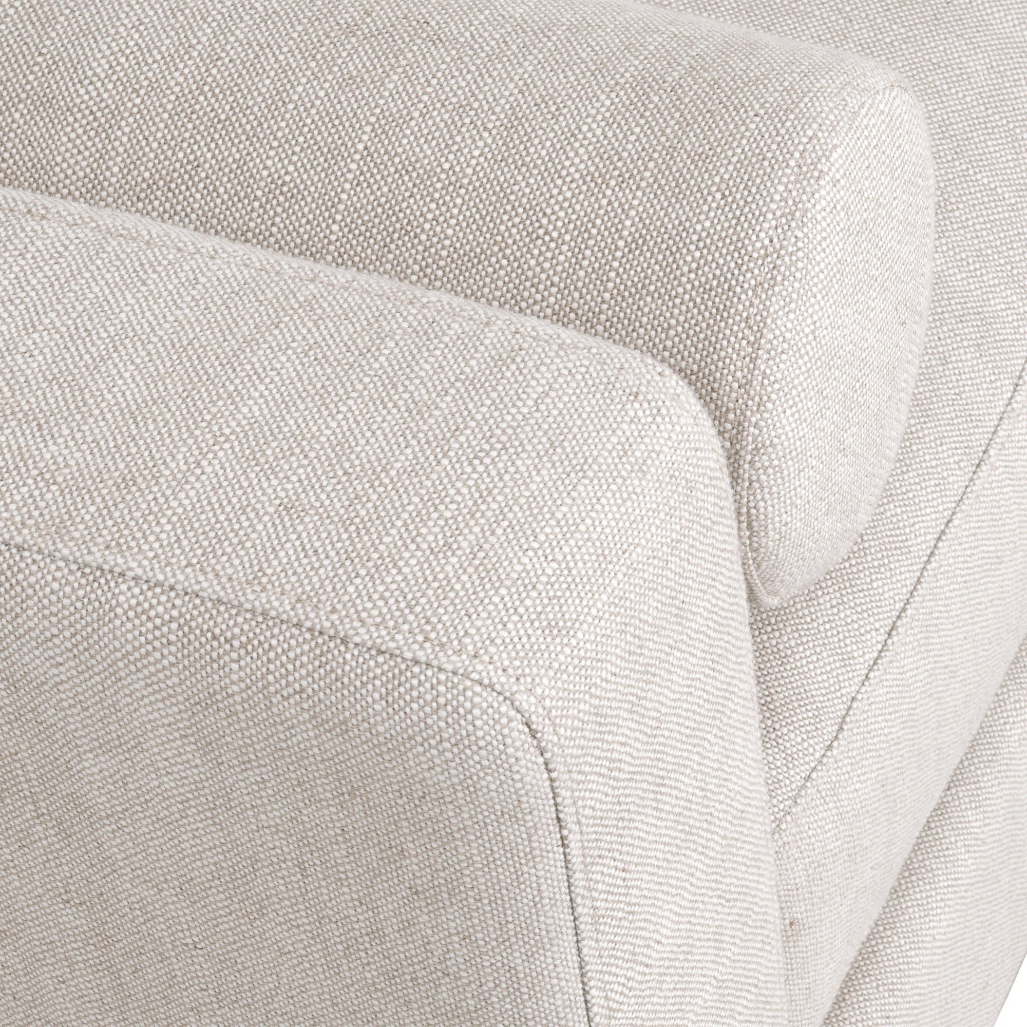 Close-up of bisque fabric upholstery and round bolster pillow on the Keaton Daybed by Essentials For Living