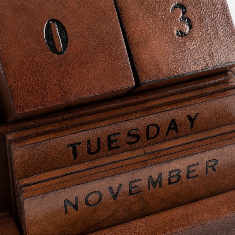 Leather desk calendar with rich leather finish and elegant tabletop design
