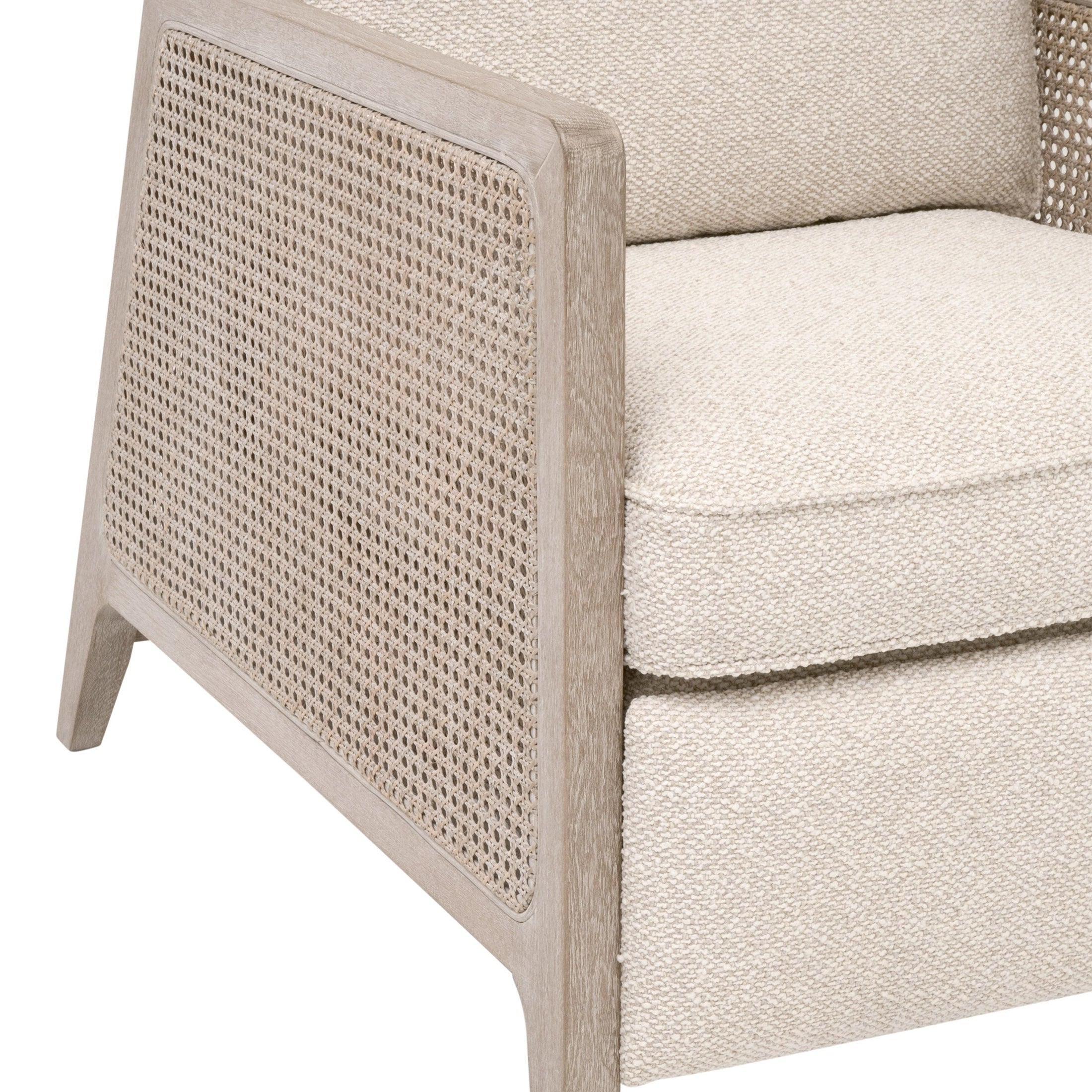 Close-up of natural gray oak and cane side panel on Leone Recliner upholstered in LiveSmart Gellar-Linen by Essentials for Living