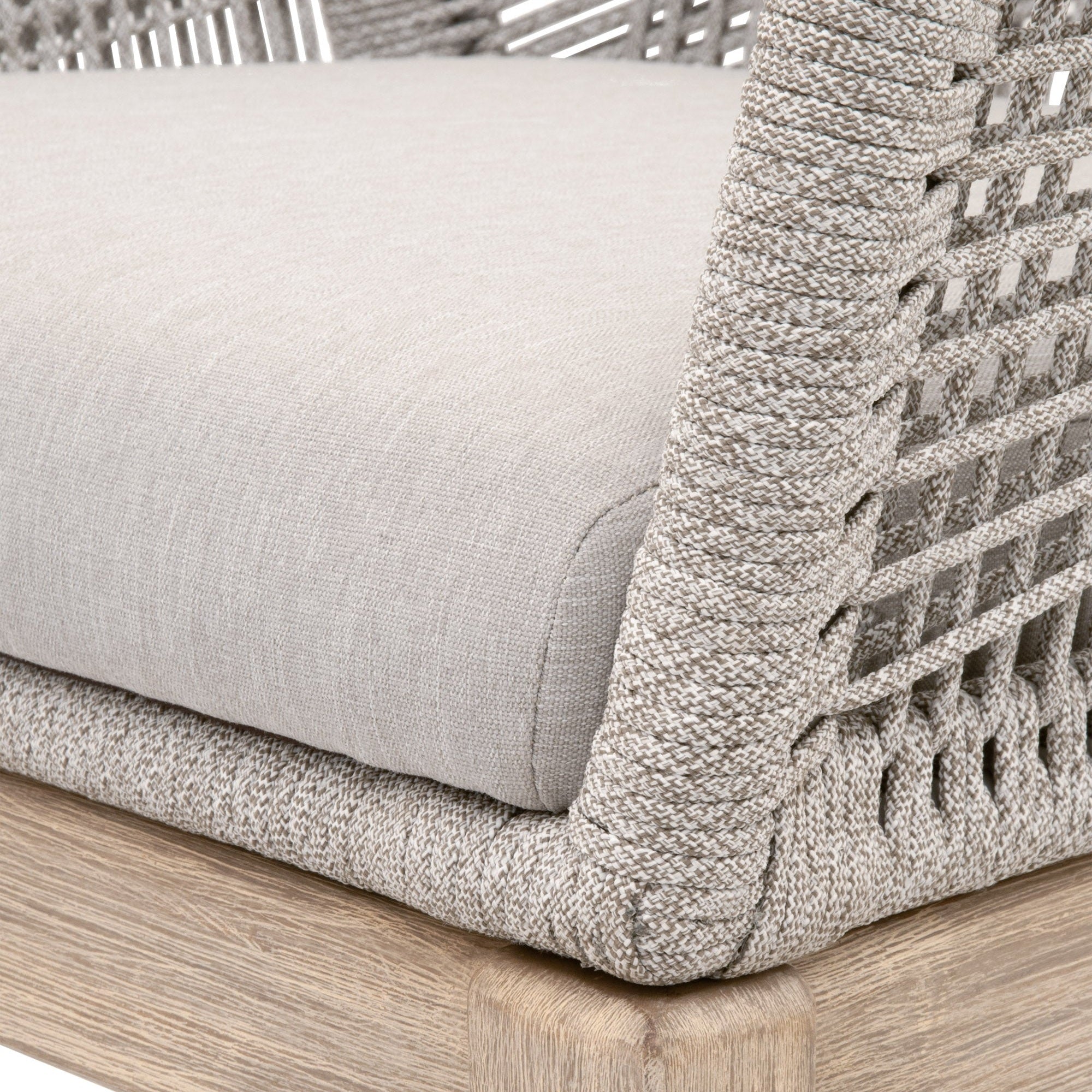 Close-up of taupe and white rope weave with pumice cushion and gray teak leg on Loom Outdoor Arm Chair, Set of 2 by Essentials For Living