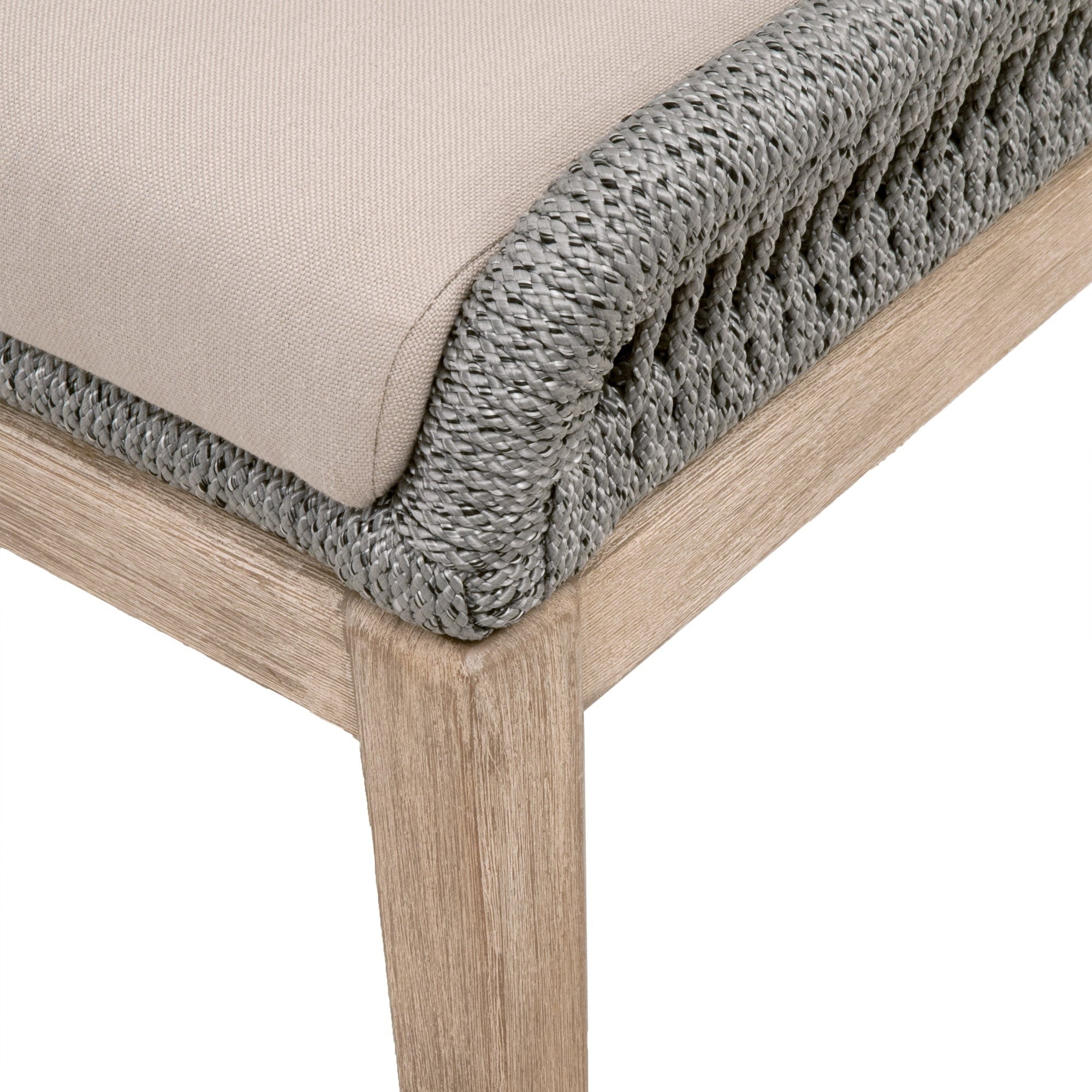 Close-up of Loom Dining Chair corner showing woven taupe rope and distressed natural gray wood leg with beige cushion