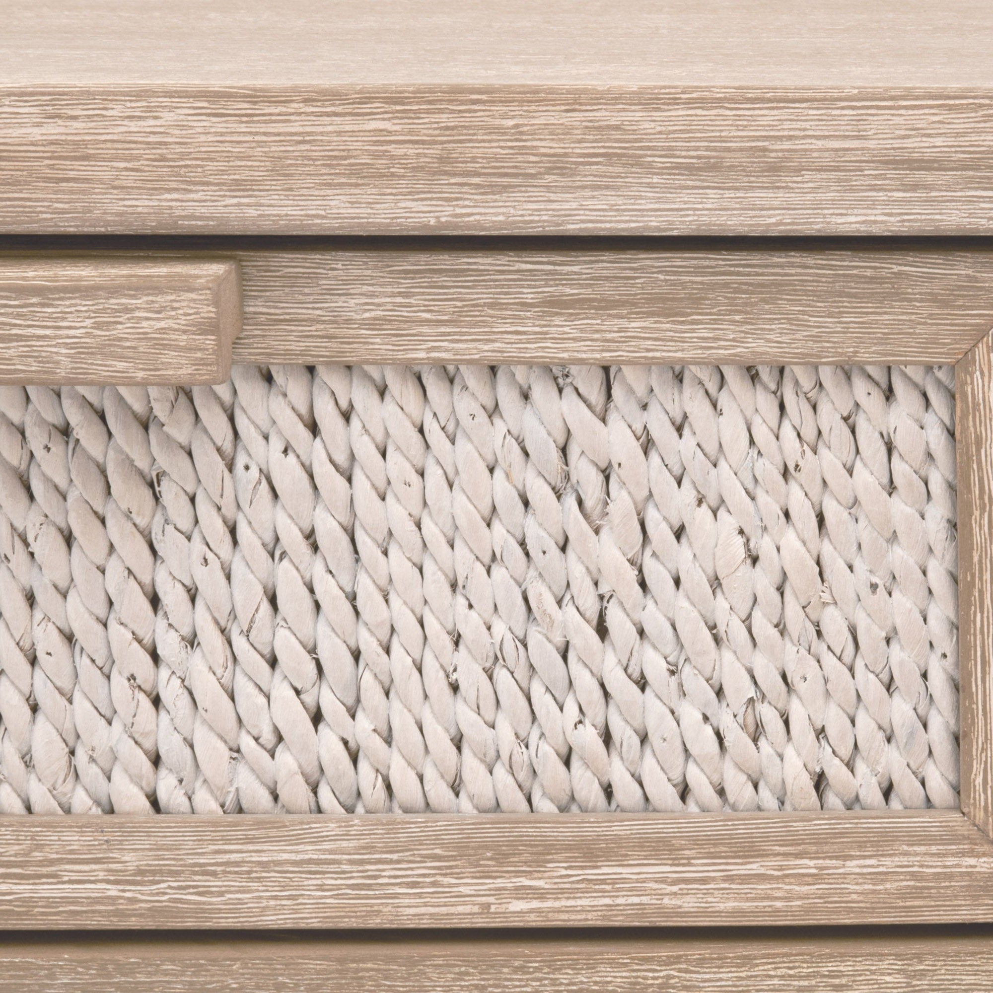 Close-up of woven white-washed abaca rope drawer on Malay 1-Drawer Nightstand by Essentials for Living.