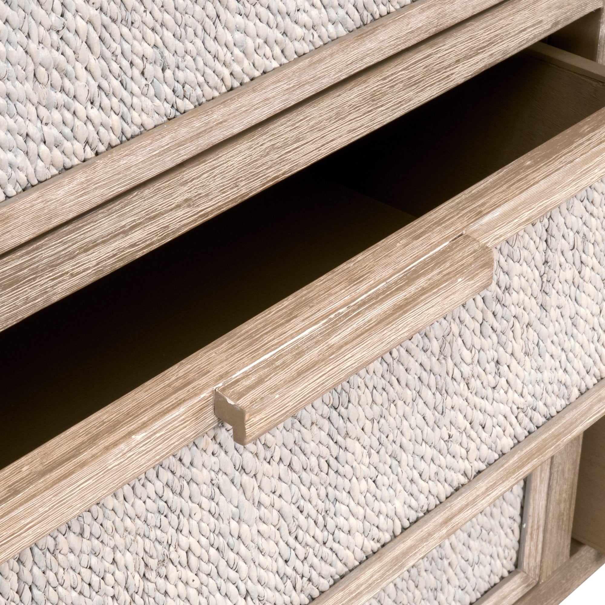 Close-up of white-washed abaca rope detail and solid mahogany handle on Malay 6-Drawer Double Dresser by Essentials For Living