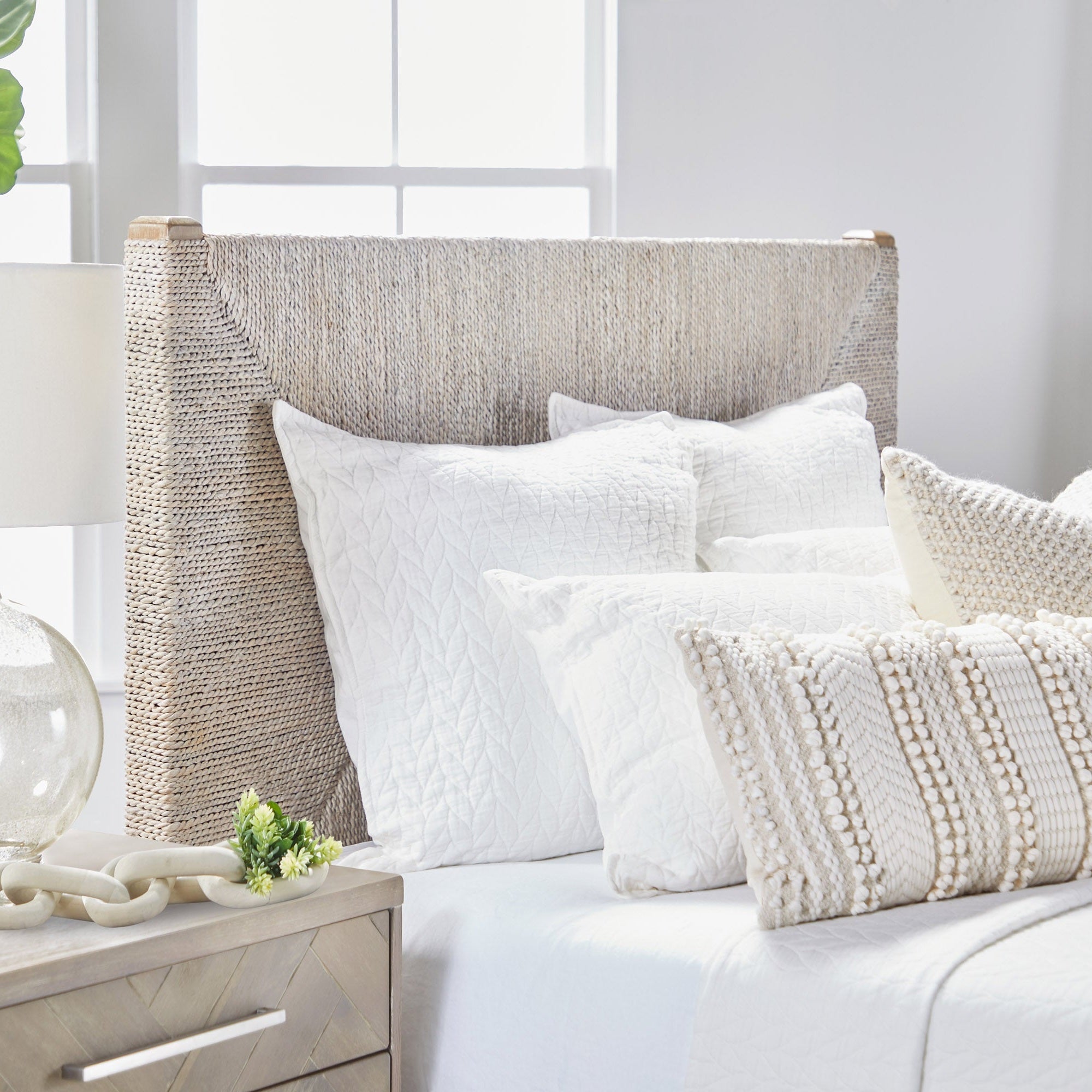 Malay Queen Bed with white-washed abaca rope headboard in natural coastal style by Essentials for Living