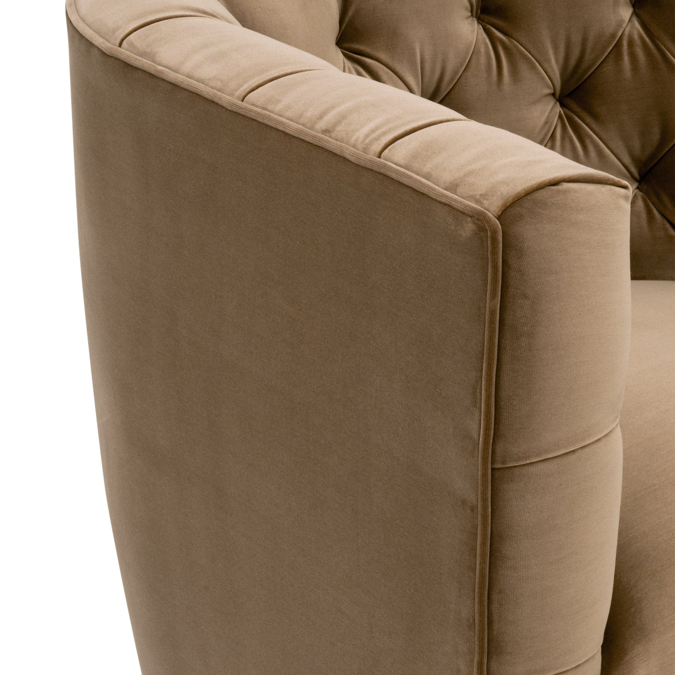 Close-up of caramel velvet tufted armrest on Marcel Swivel Club Chair by Essentials for Living