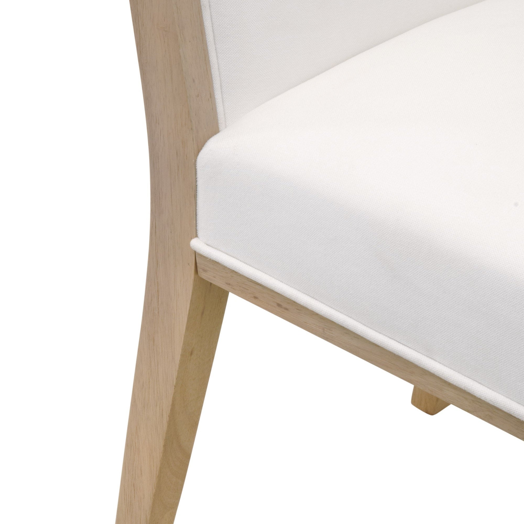 Close-up of Essentials for Living Martin Dining Chair with natural wood frame and white upholstered seat cushion
