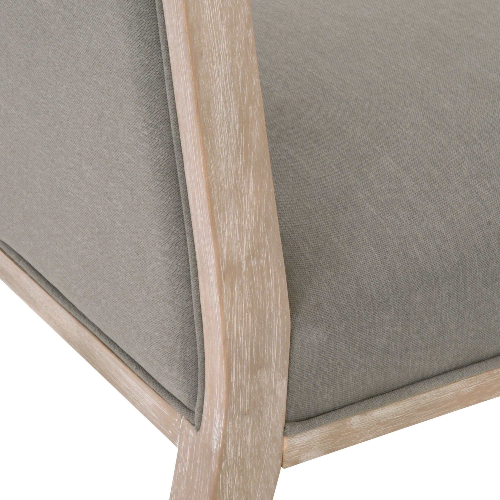 Close-up of Martin Dining Chair corner showing natural gray solid rubberwood frame and slate fabric upholstery by Essentials for Living