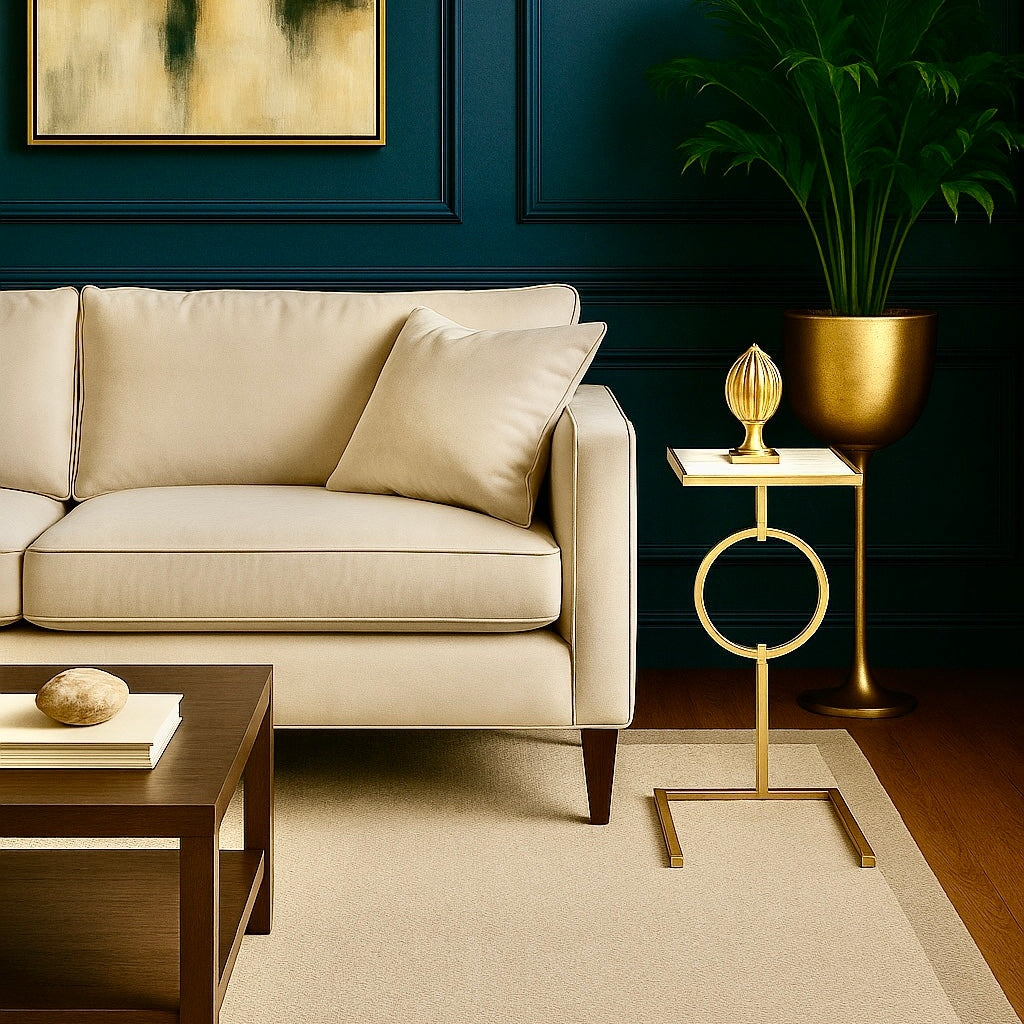 Maxine Side Table with metallic gold frame and white marble top beside beige sofa in modern living room GO HOME