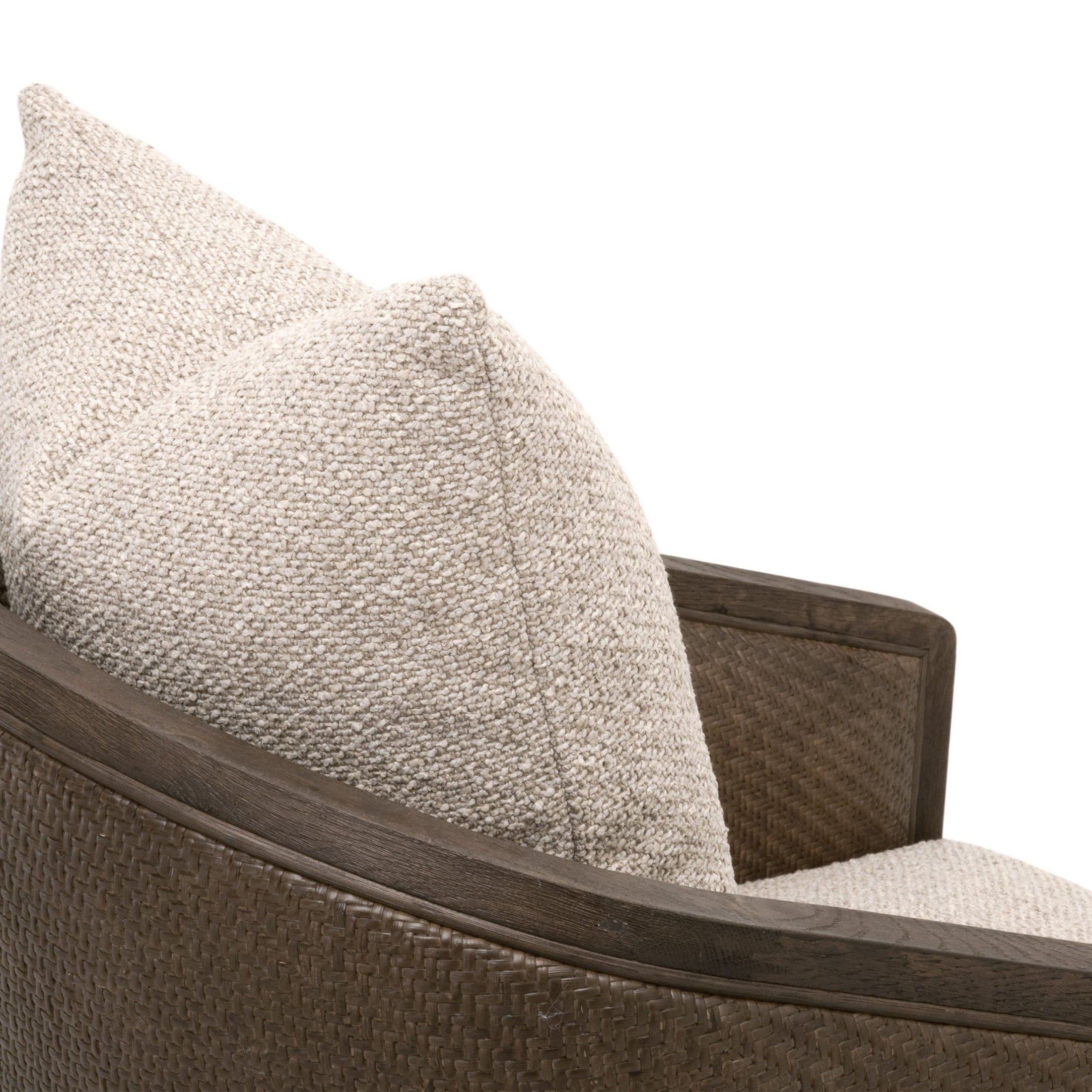 Close-up of Essentials for Living McGuire Arm Chair showing handwoven rattan frame and soft textured cushions