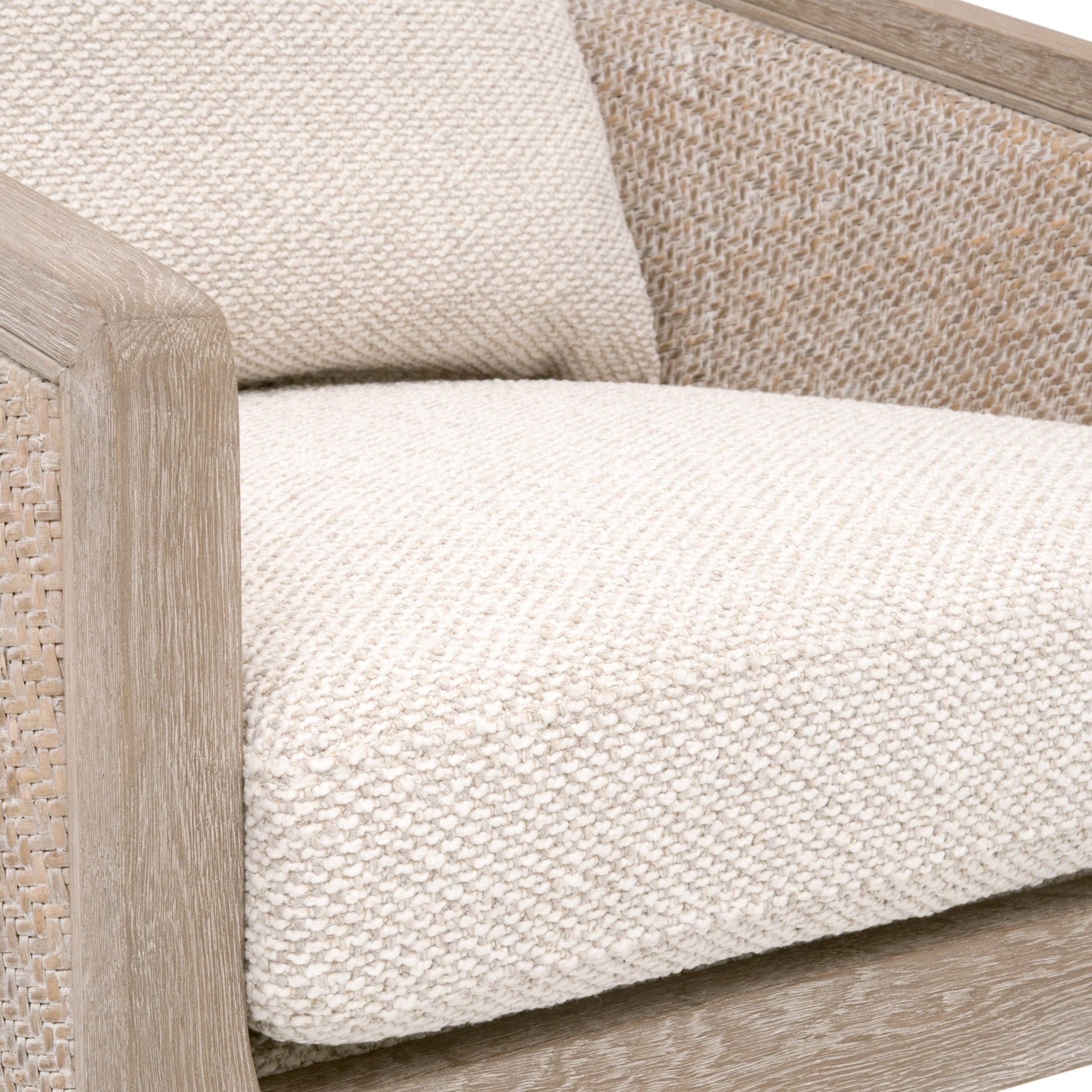 Close-up of McGuire Counter Stool seat cushion and natural gray rattan frame by Essentials for Living
