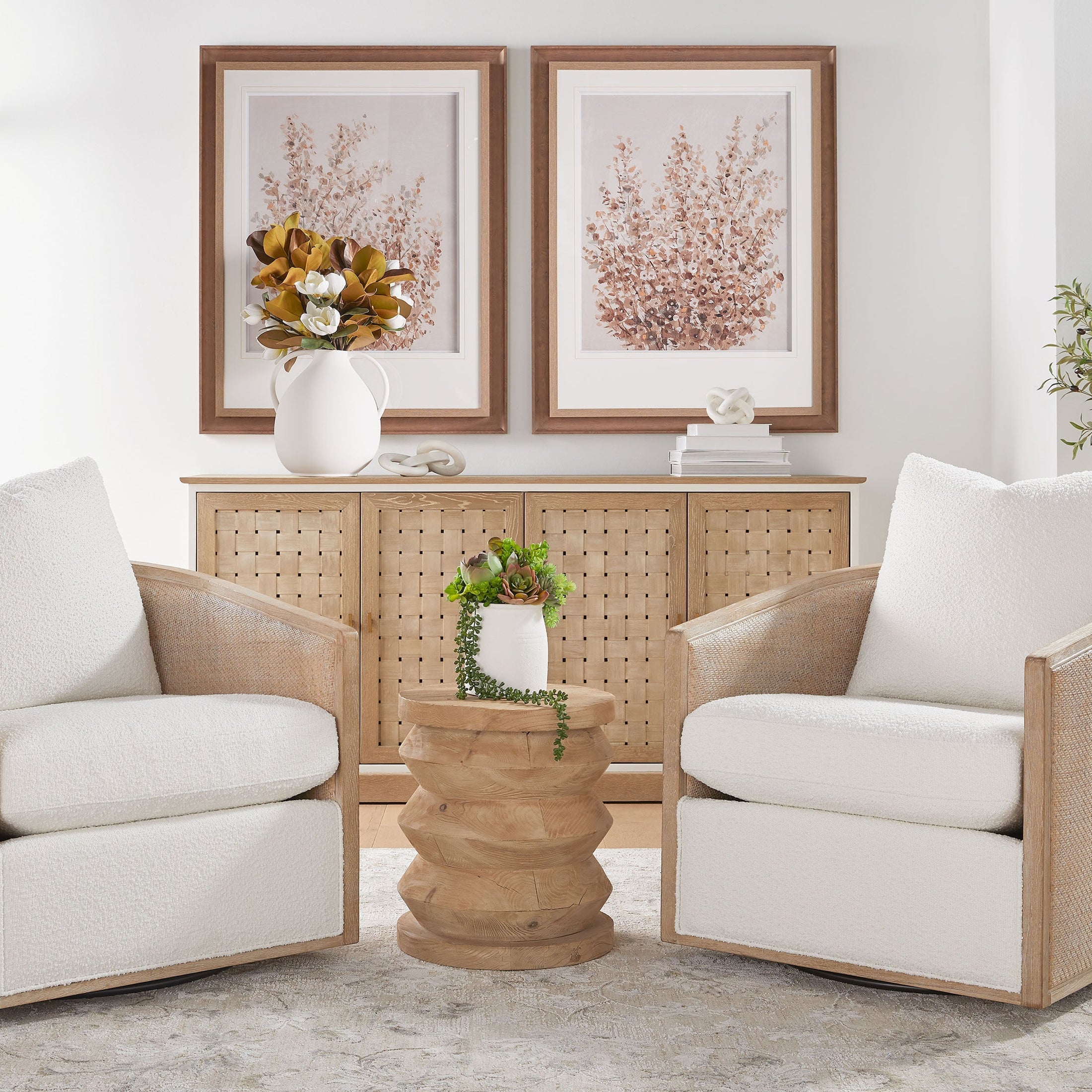 Two Essentials for Living McGuire Swivel Club Chairs with natural oak and Snow Boucle upholstery in a cozy living room setting