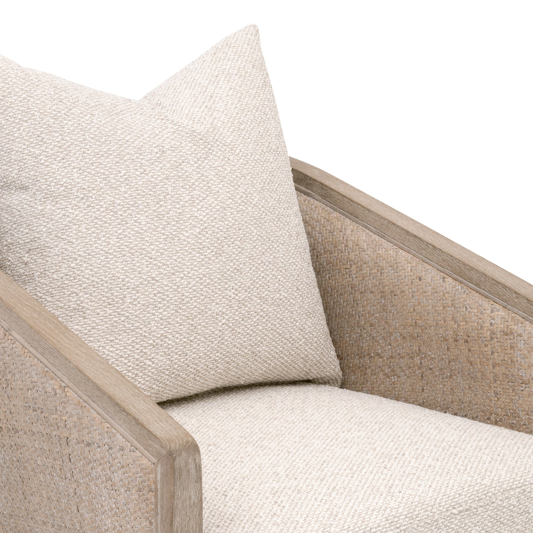 Close-up of McGuire Arm Chair showing natural gray rattan frame and beige LiveSmart Gellar-Linen cushion with pillow