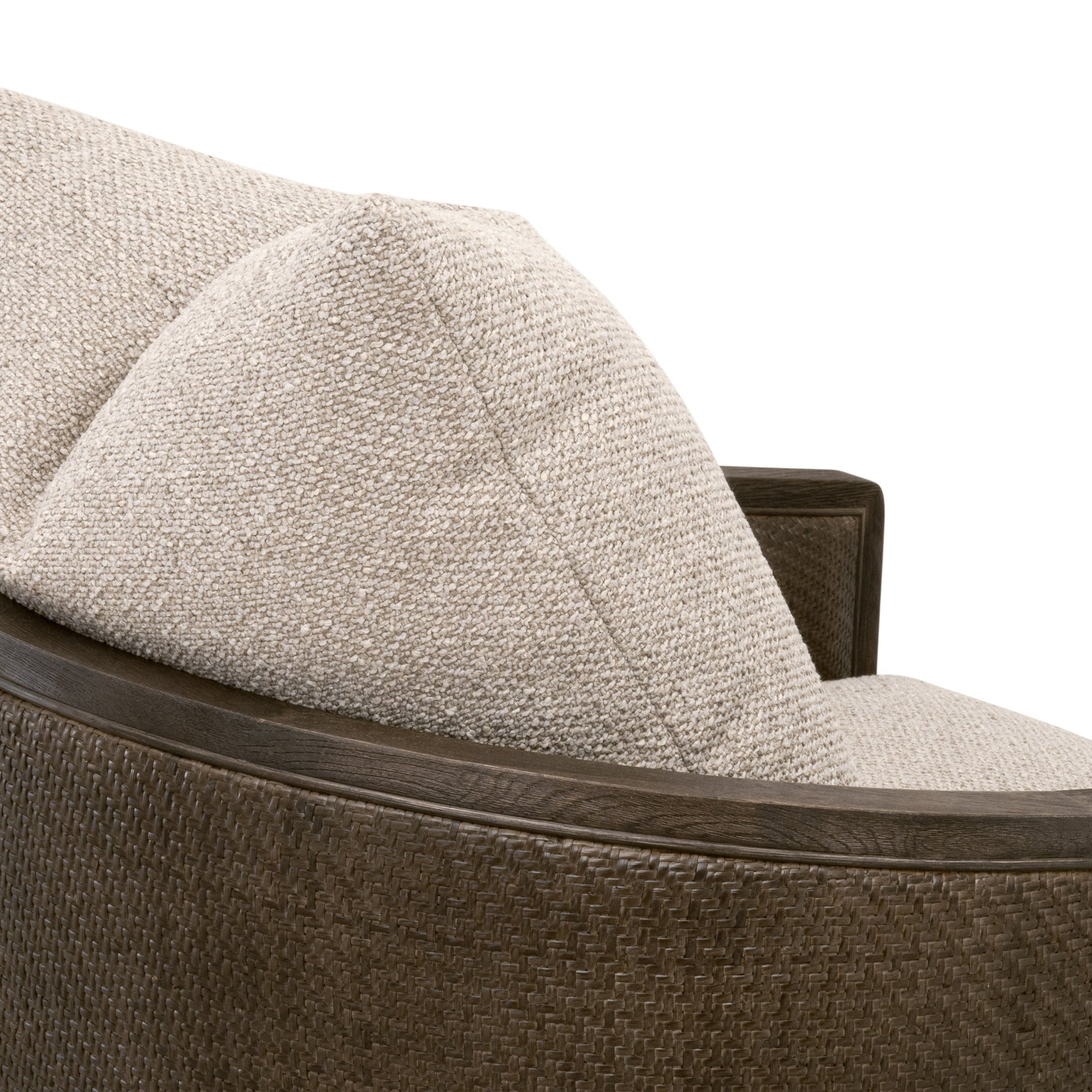 Close-up of McGuire Swivel Club Chair showing handwoven natural gray cane frame and soft boucle upholstery cushion