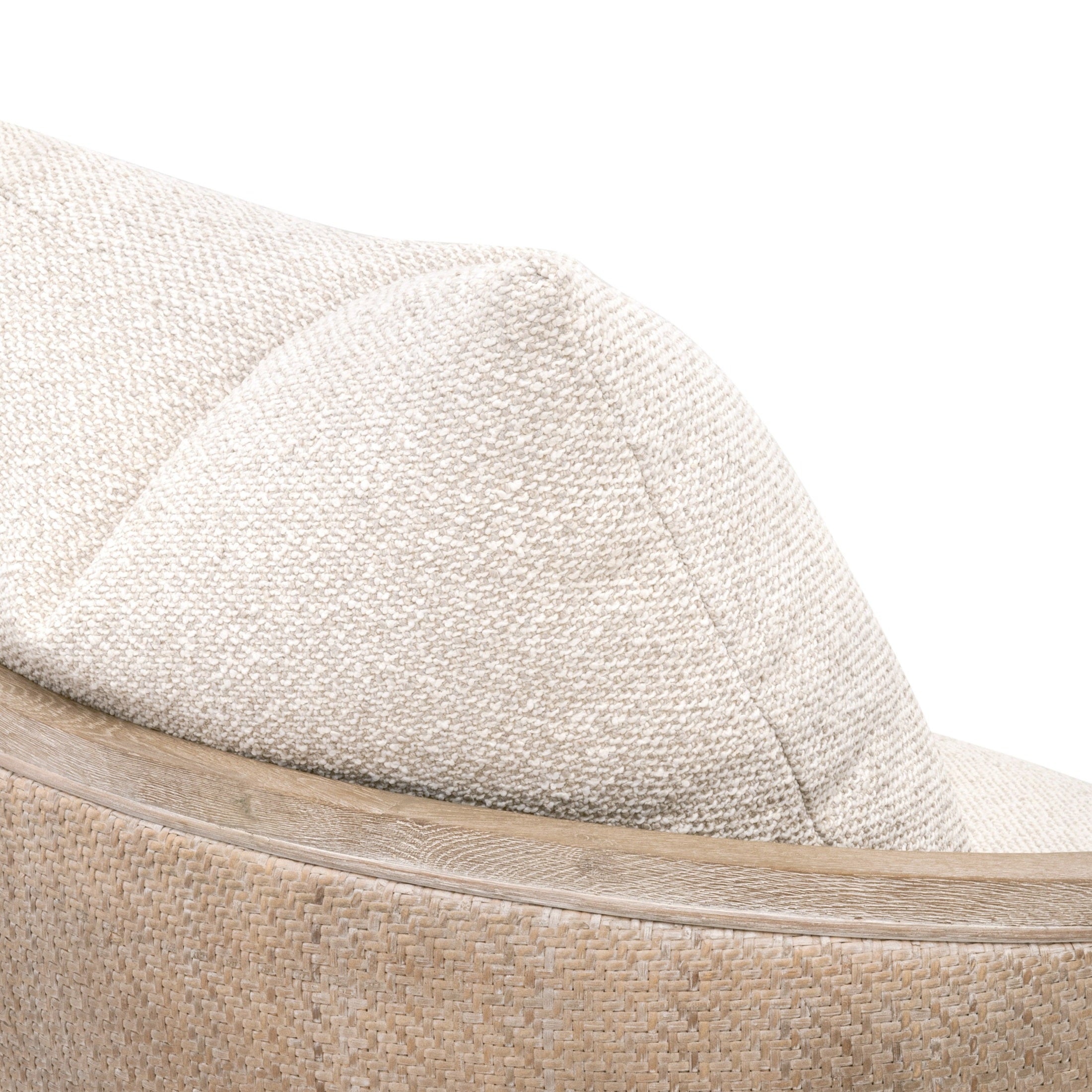 Close-up of Essentials for Living McGuire Swivel Club Chair featuring natural cane, oak frame, and snow boucle cushion detail