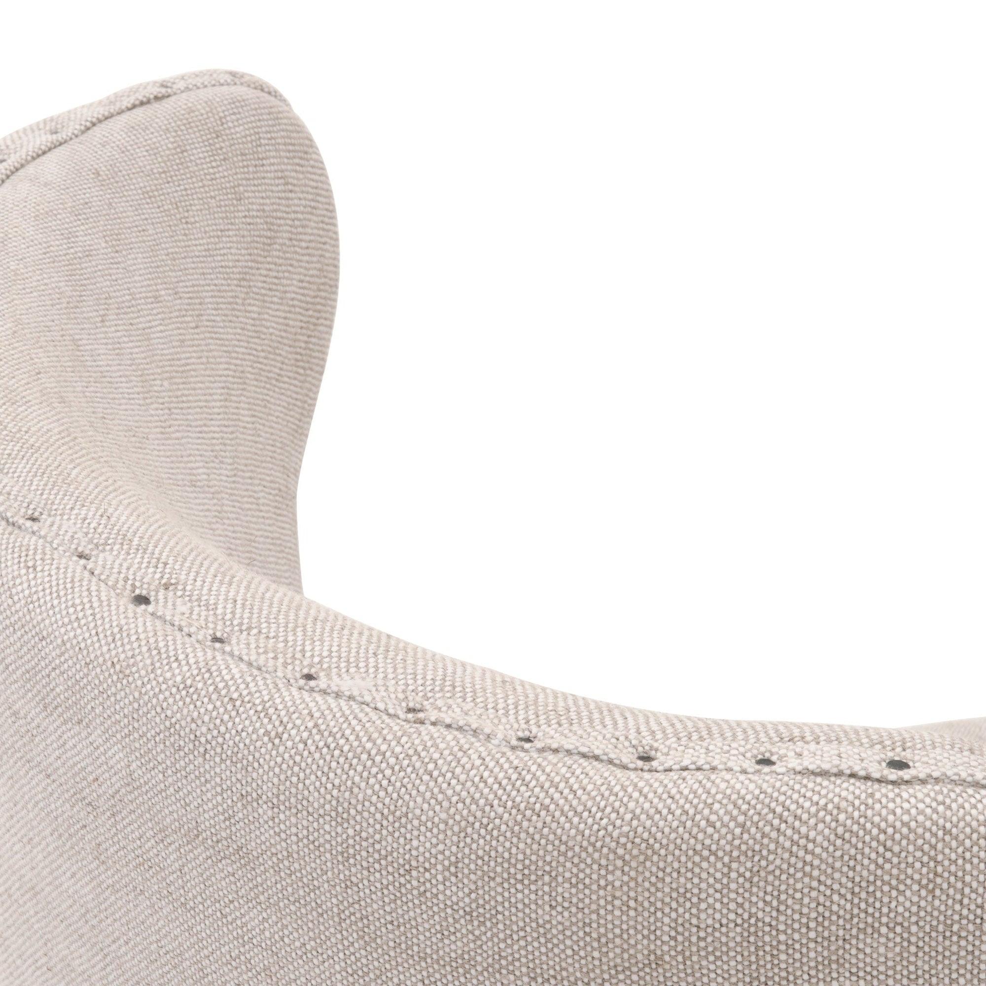 Close-up of Bisque French Linen upholstery and black nail-tack trim on Essentials for Living Milton Swivel Counter Stool