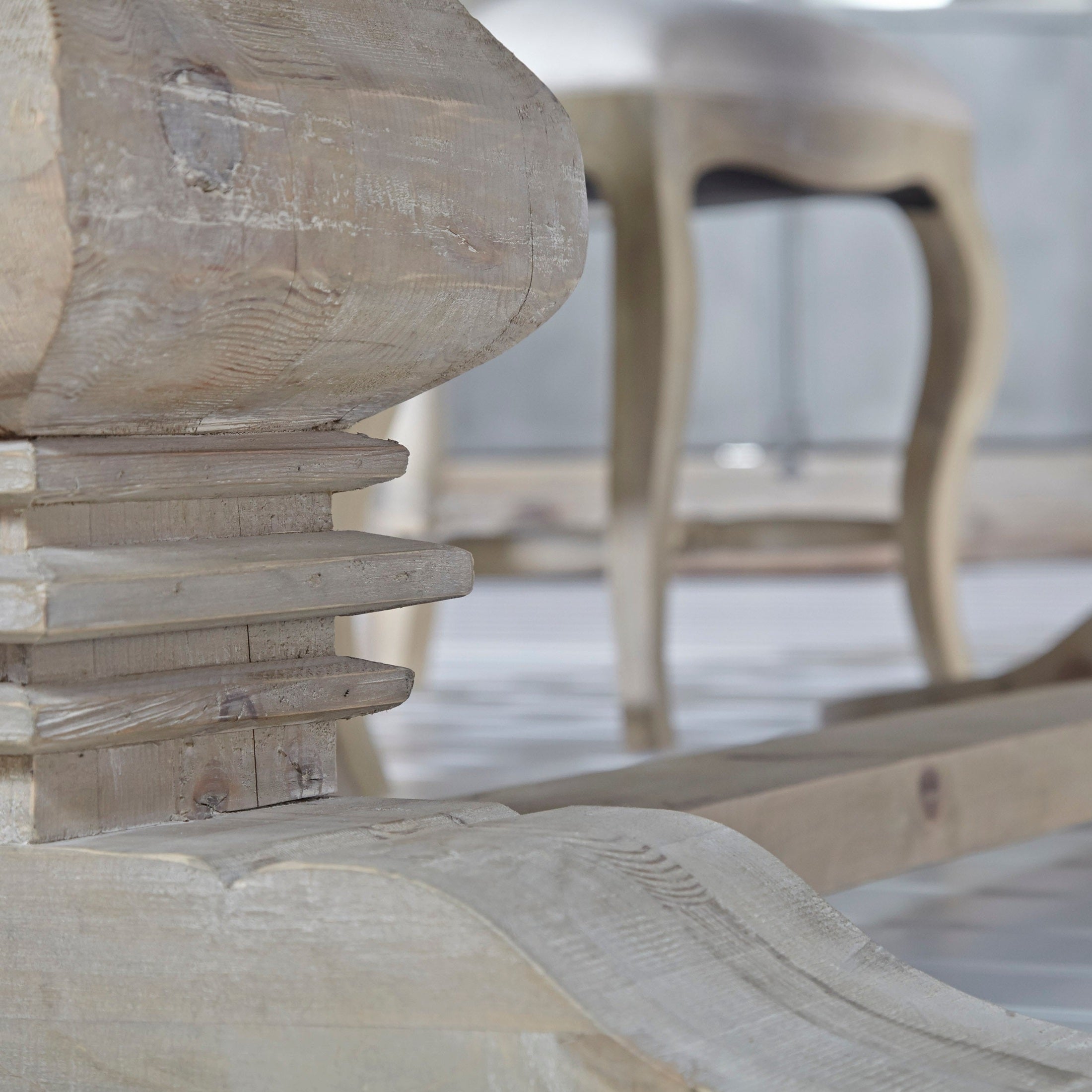 Close-up of reclaimed wood trestle base on Monastery Extension Dining Table by Essentials for Living