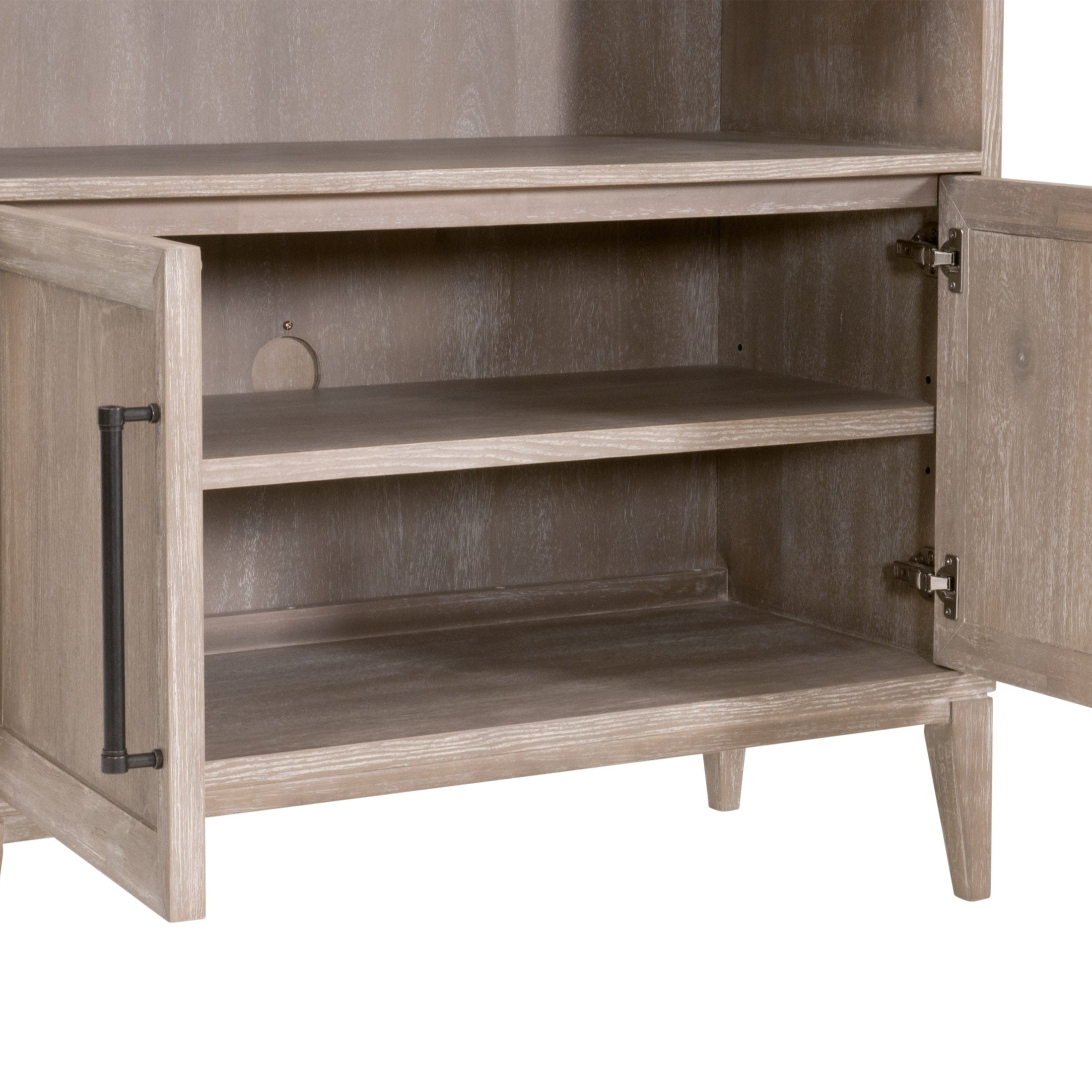 Open lower cabinet with adjustable shelving and cord cut-out in Morris Storage Bookcase by Essentials for Living.