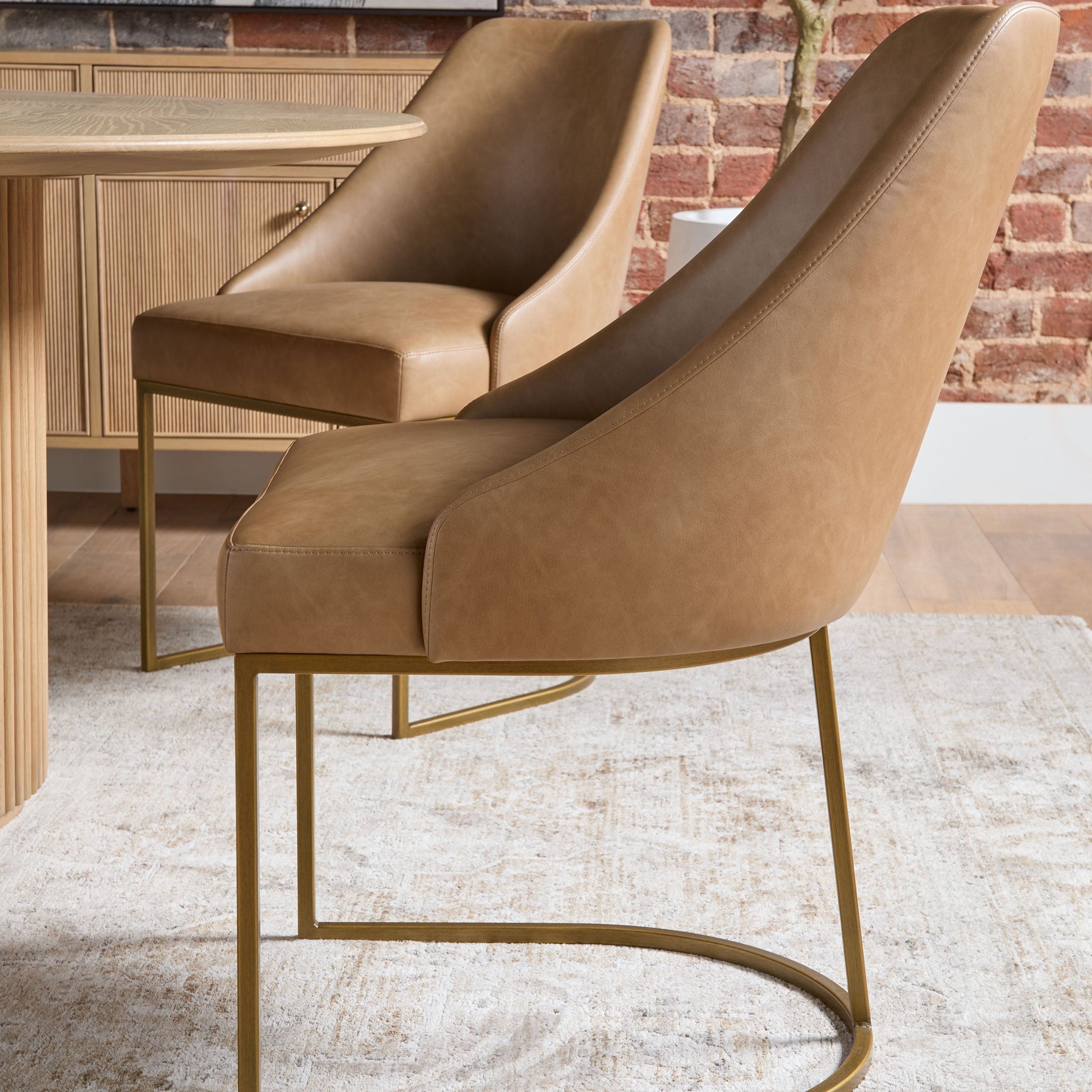 Two Parissa Dining Chairs by Essentials For Living in Ivanhoe Toast vegan leather with brushed gold steel frames