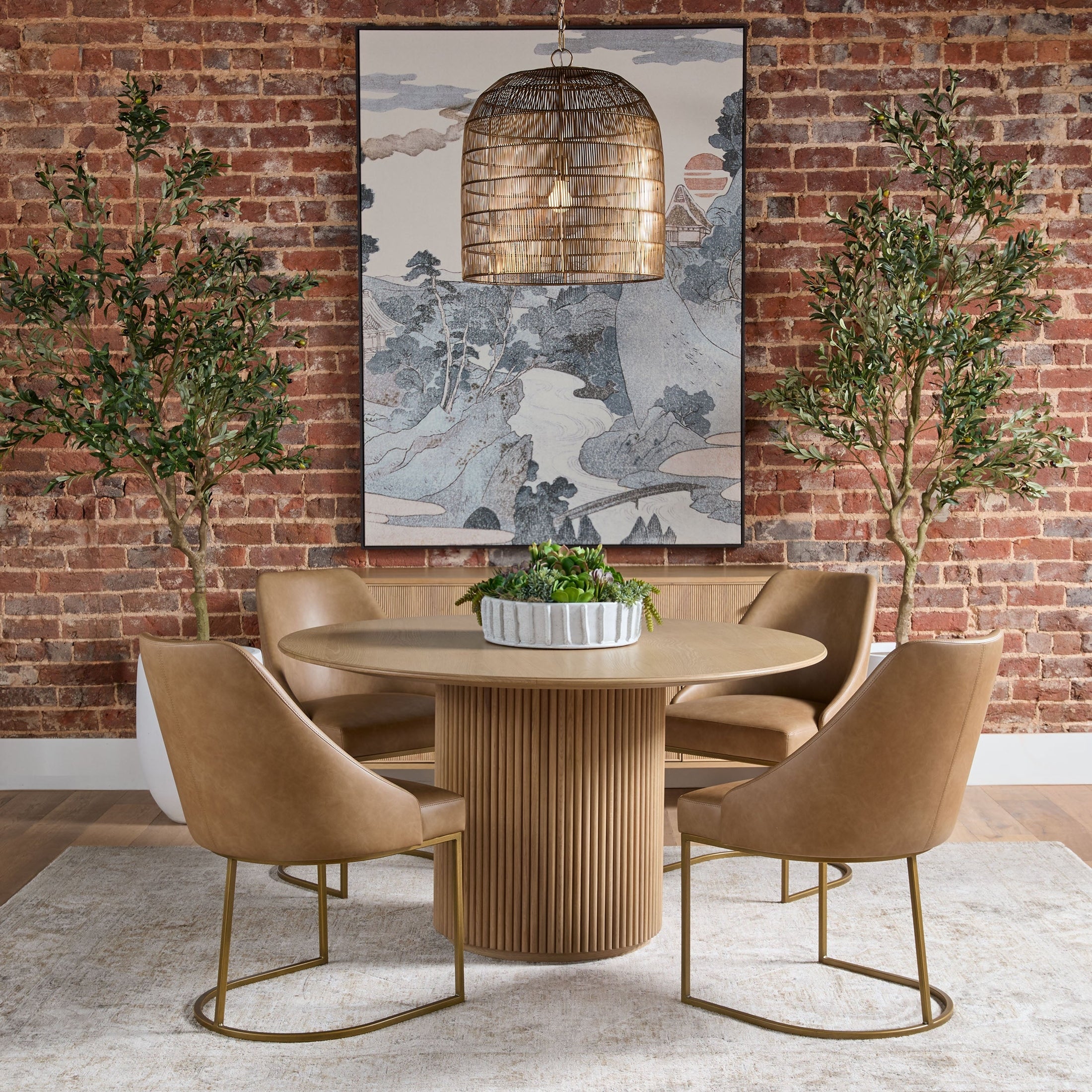 Essentials for Living Parissa Dining Chairs in Ivanhoe Toast vegan leather with brushed gold cantilever frames in stylish dining room setting