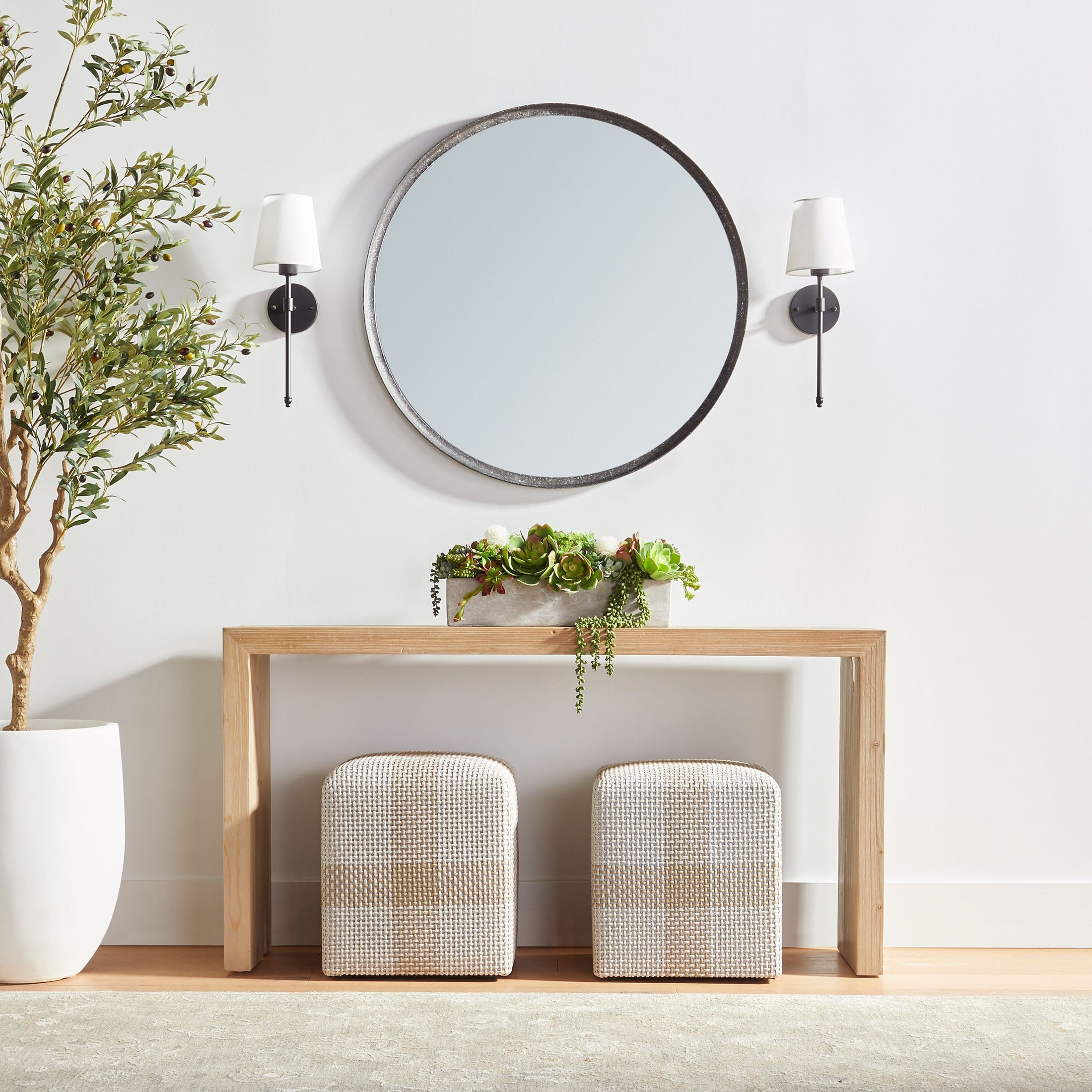 Light smoke gray Reed Console Table with minimalist design in styled entryway by Essentials For Living