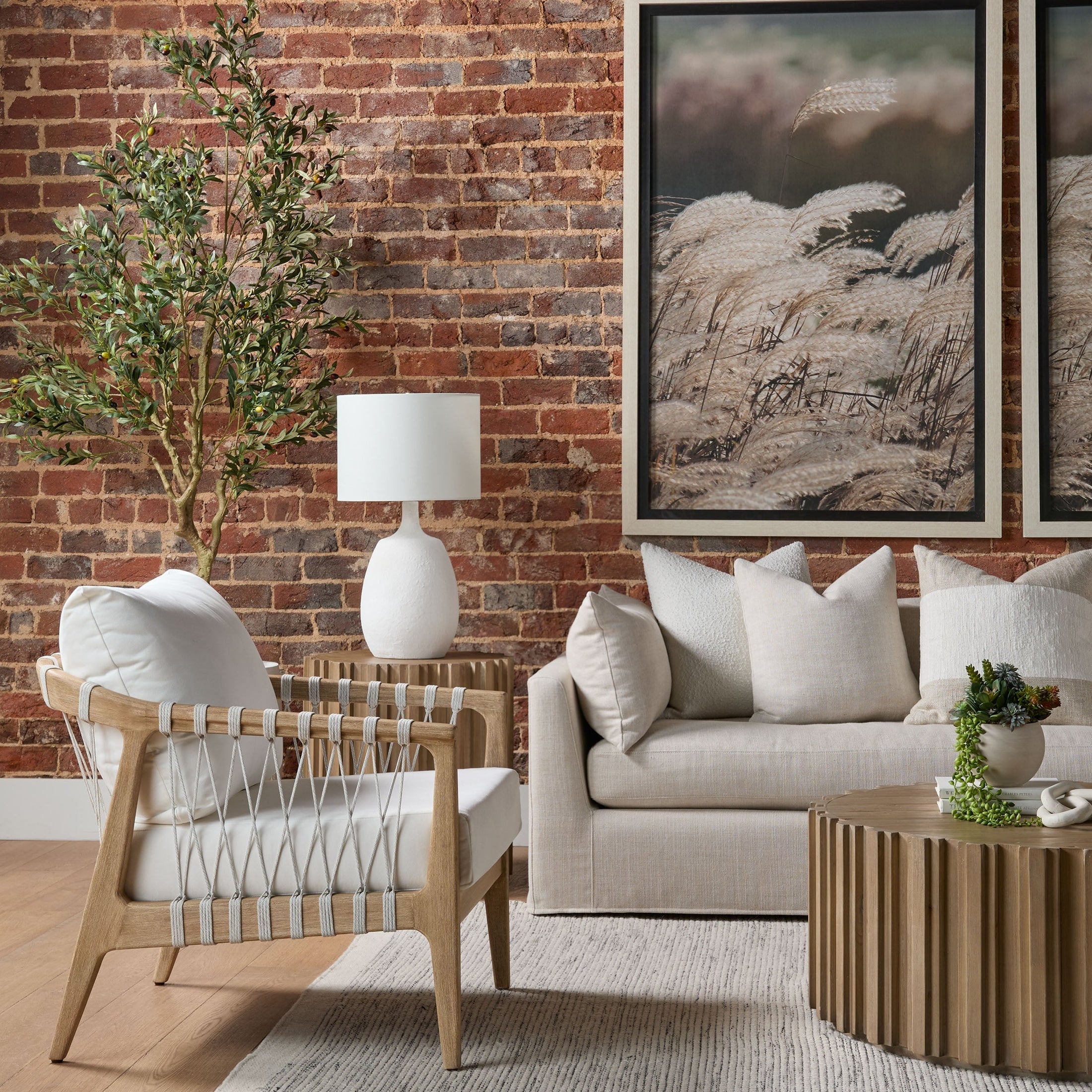 Roma End Table by Essentials For Living with smoke gray finish and wood fluting in a stylish living room setting