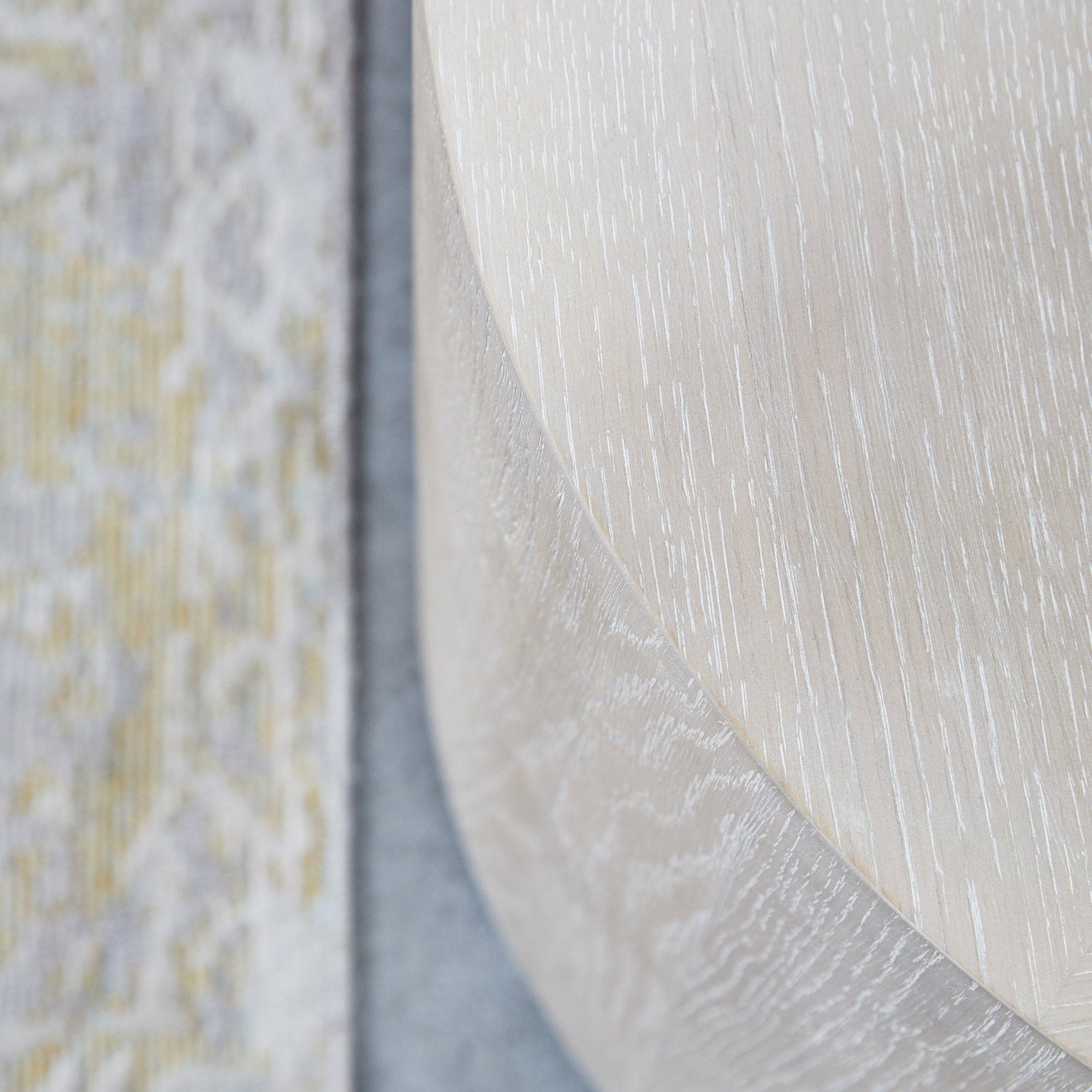 Close-up of natural gray oak veneer texture on Roto Large End Table by Essentials for Living