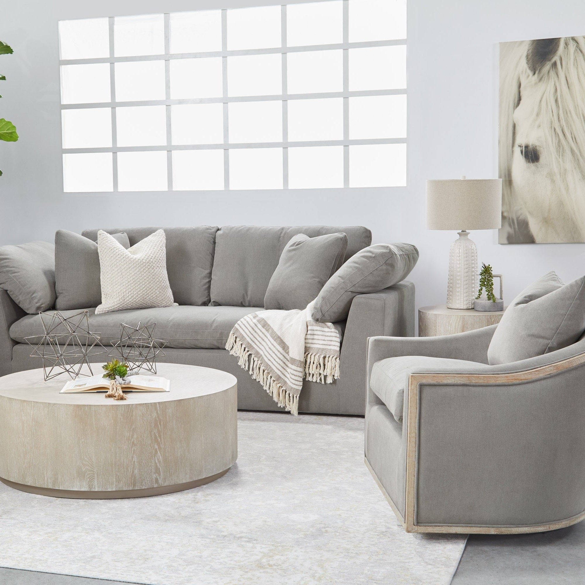 Round Roto Large End Table in natural gray oak with brushed silver trim in modern living room by Essentials for Living