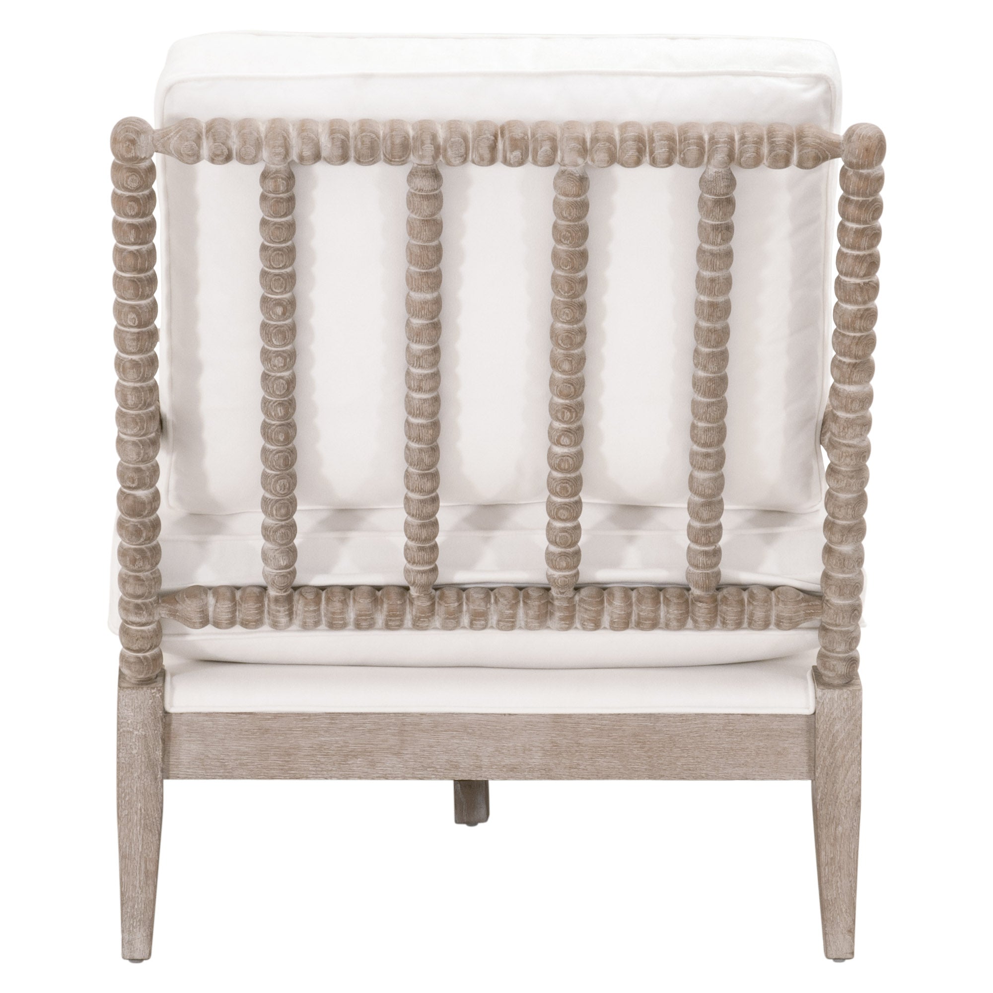 Back view of Rouleau Chaise Lounge with carved spool-style natural gray oak frame and white cushions by Essentials For Living