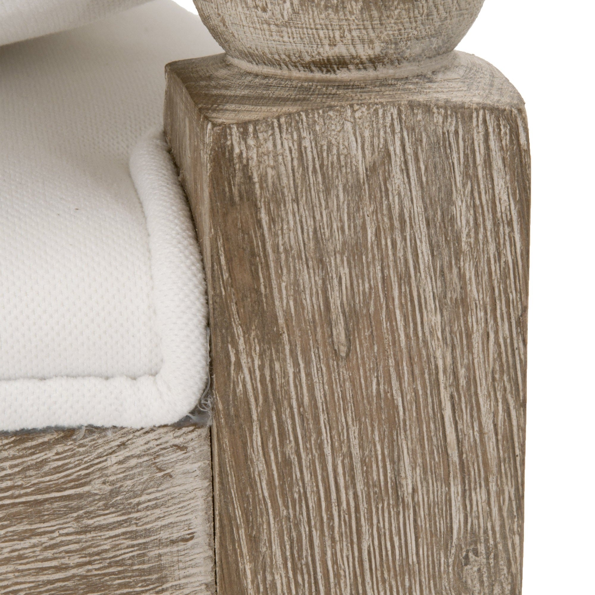 Close-up of Rouleau Club Chair showing solid gray oak frame with carved spool detailing and white fabric upholstery.