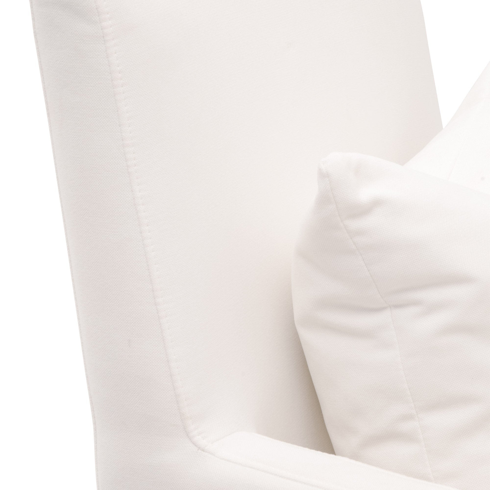 Close-up of Essentials for Living white Shelter slipcover armchair with plush lumbar pillow and smooth fabric upholstery
