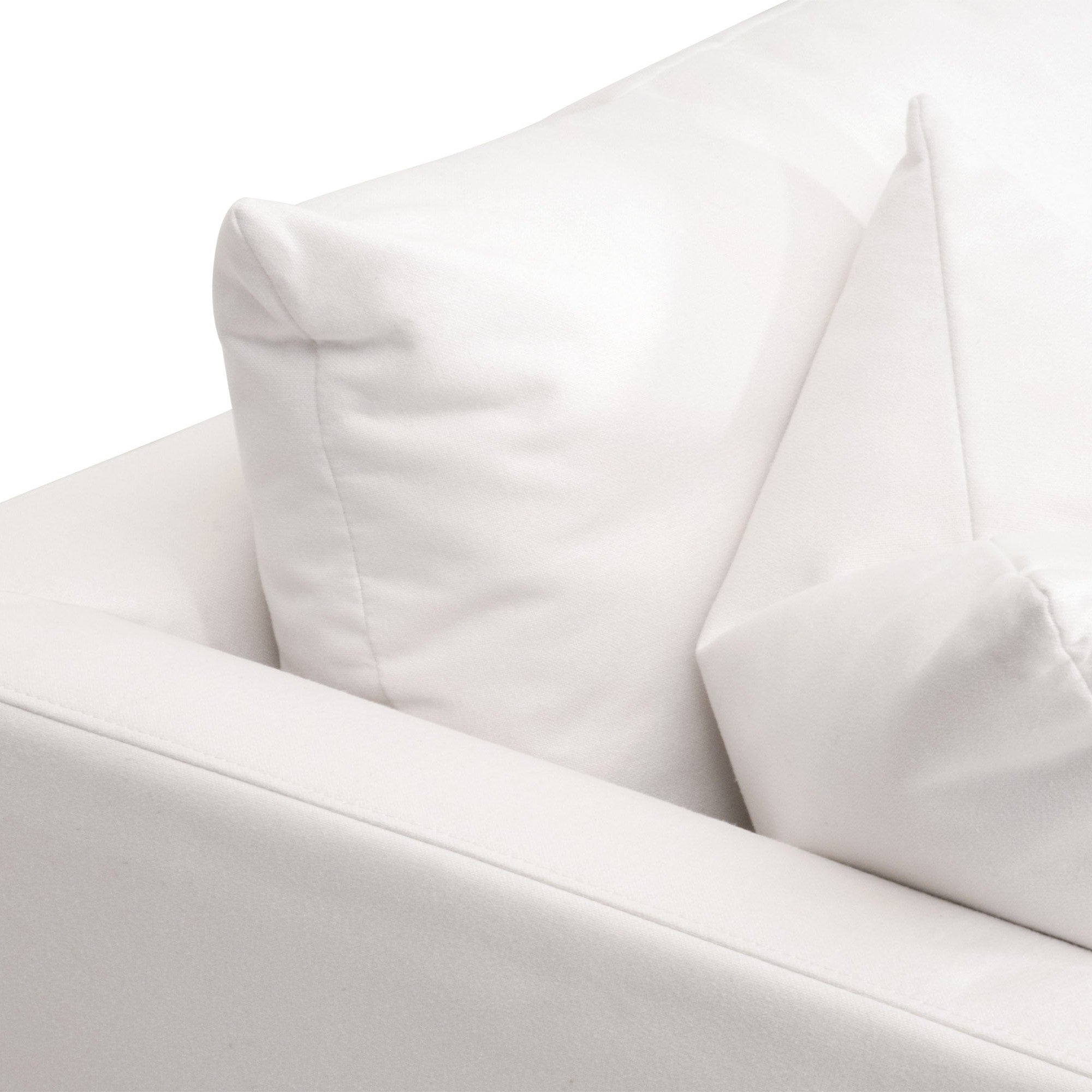Close-up of ivory upholstered Siena 96 sofa corner with plush cushions and clean, modern lines by Essentials for Living