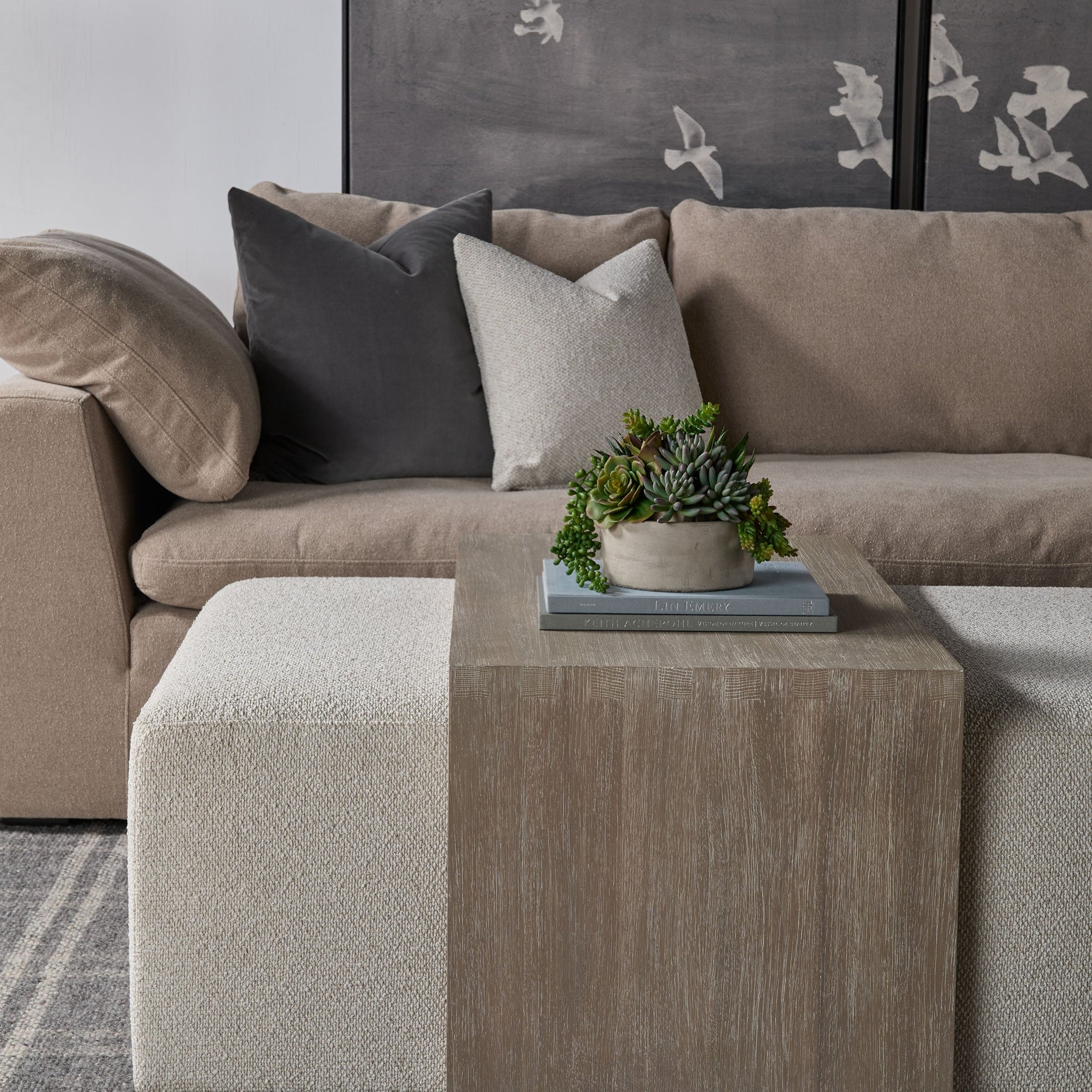 Essentials for Living Sky Modular Armless Chair in neutral fabric with plush cushions in modern living room setting