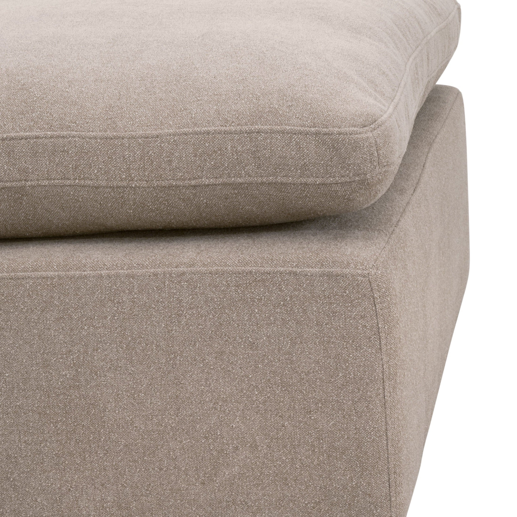 Close-up of gray fabric upholstered cushion with soft texture on modular ottoman by Essentials For Living