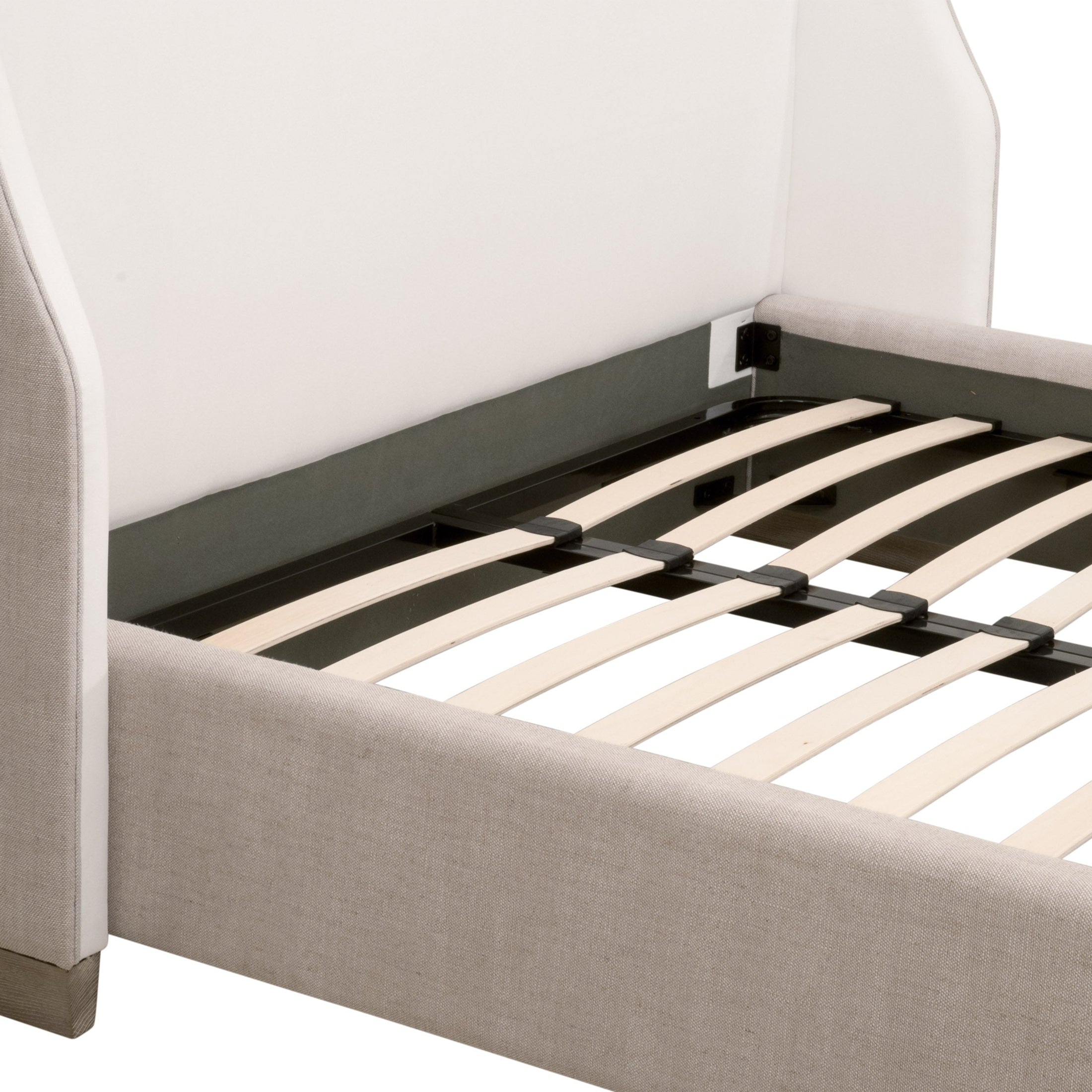 Close-up of Essentials For Living Sloan Queen Bed frame with bisque linen upholstery and natural gray oak legs