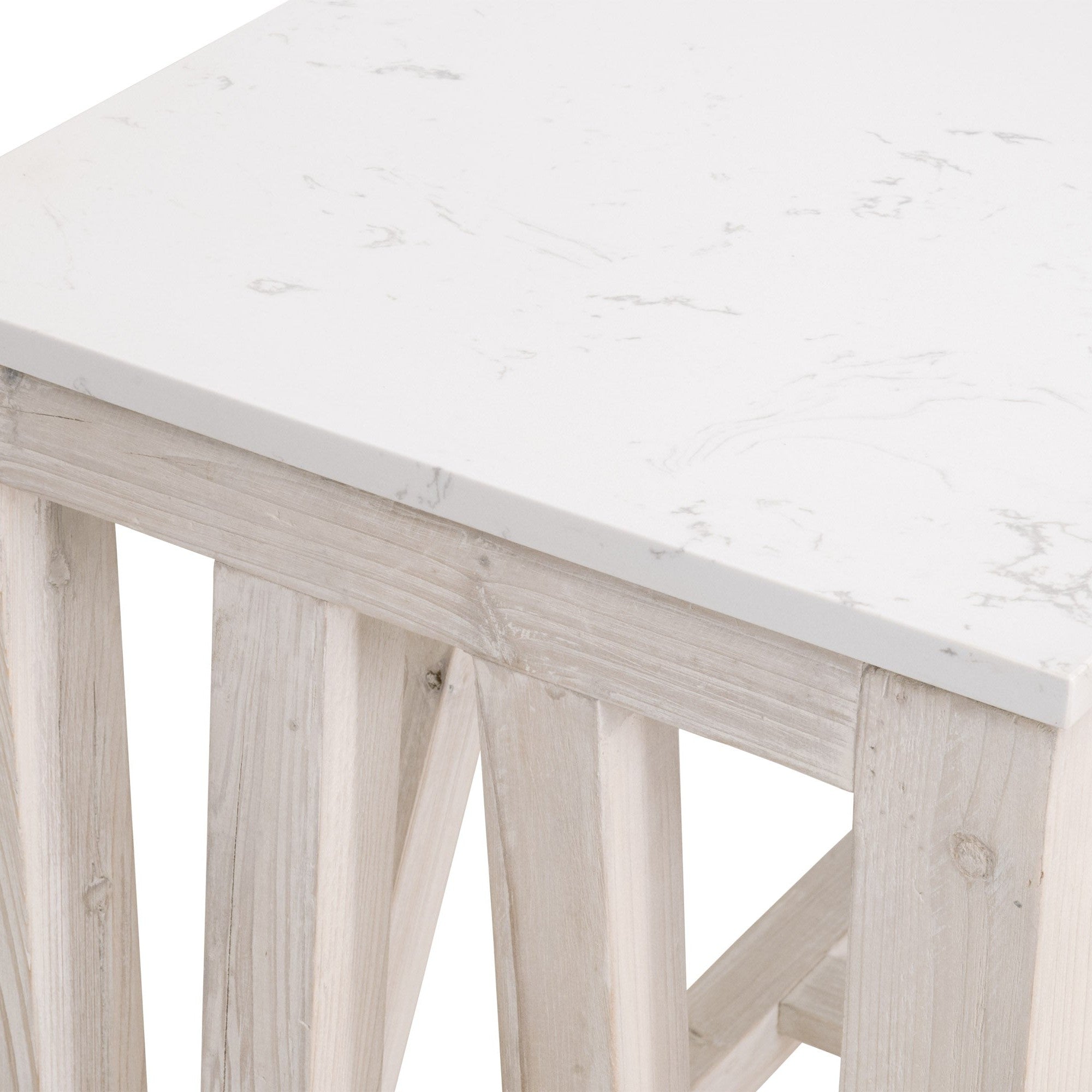 Close-up of Spruce Coffee Table showing solid white quartz top and light reclaimed pine wood trestle base by Essentials for Living