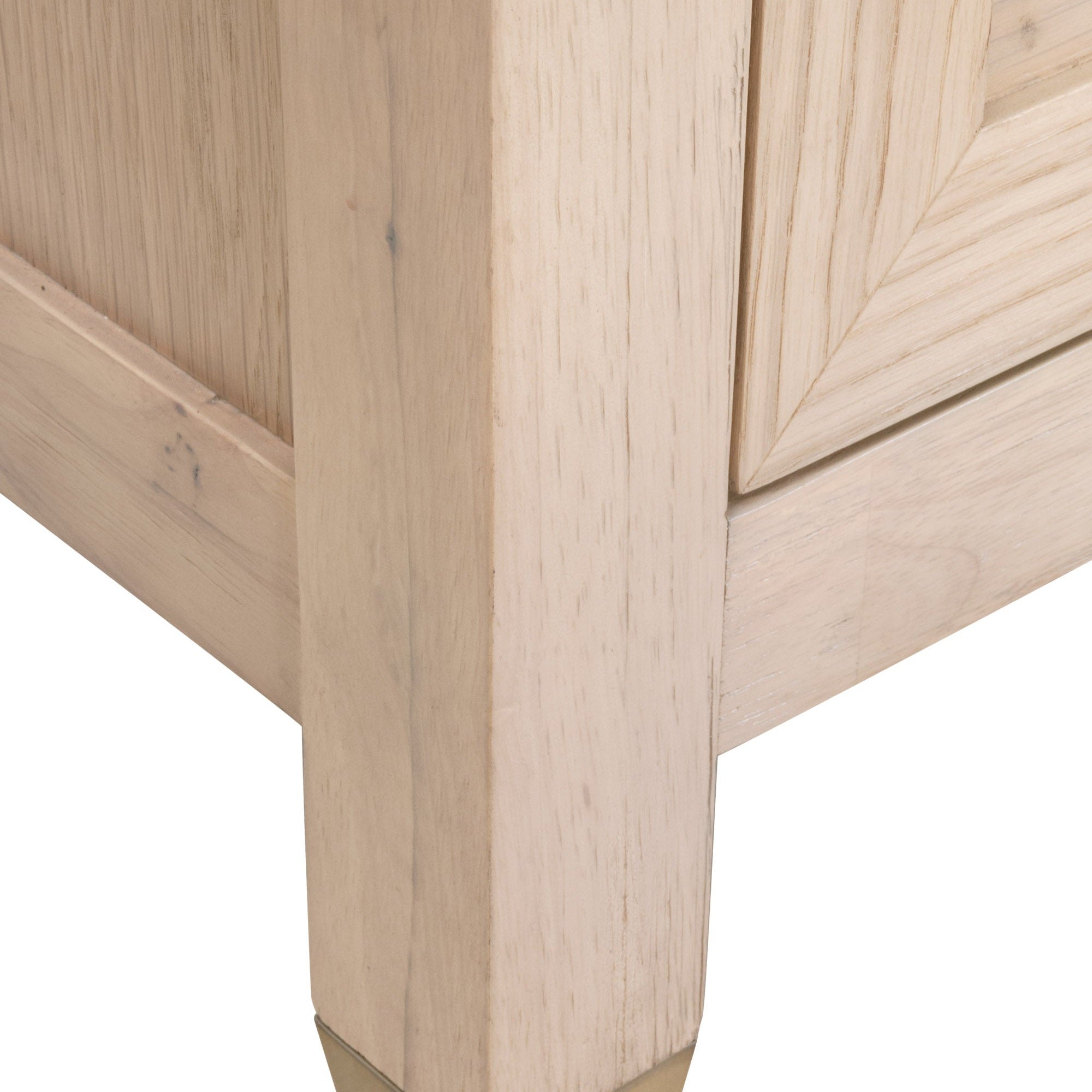 Close-up of solid rubberwood corner and brushed brass foot detail on Essentials for Living dresser leg