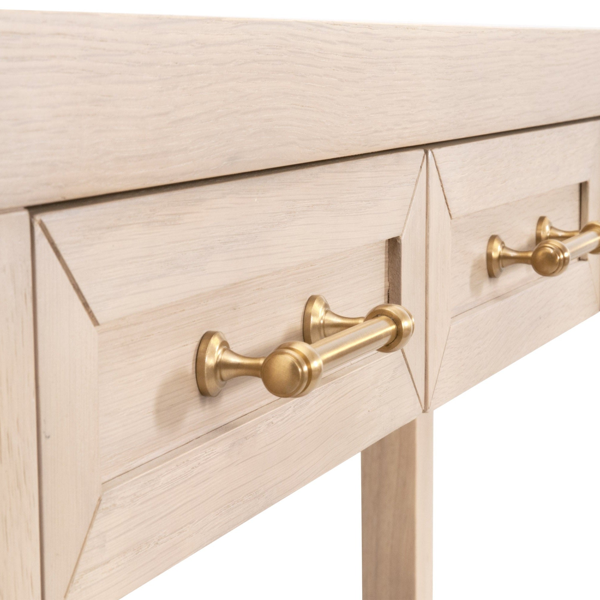 Close-up of Stella Narrow Console Table drawers with brushed brass hardware and light honey oak finish by Essentials For Living