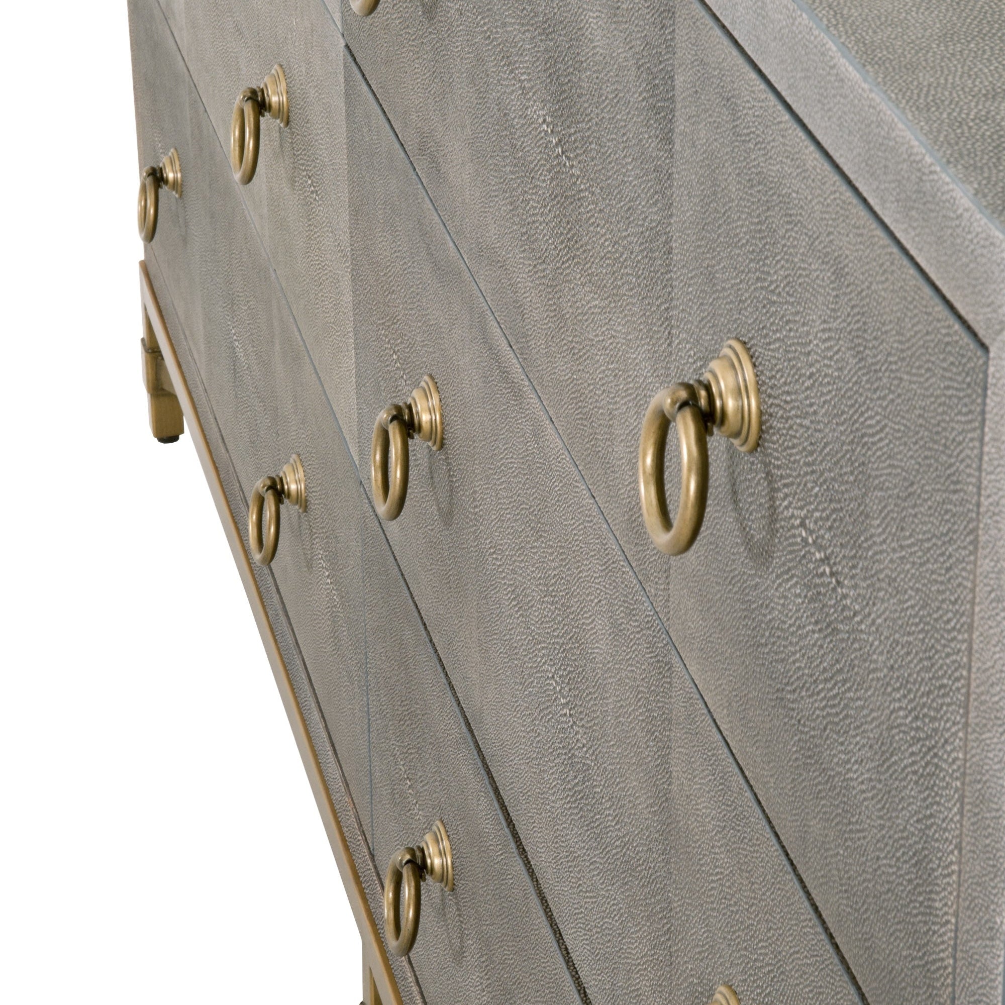 Close-up of pearl white faux shagreen dresser with six drawers and brushed gold ring pulls by Essentials for Living