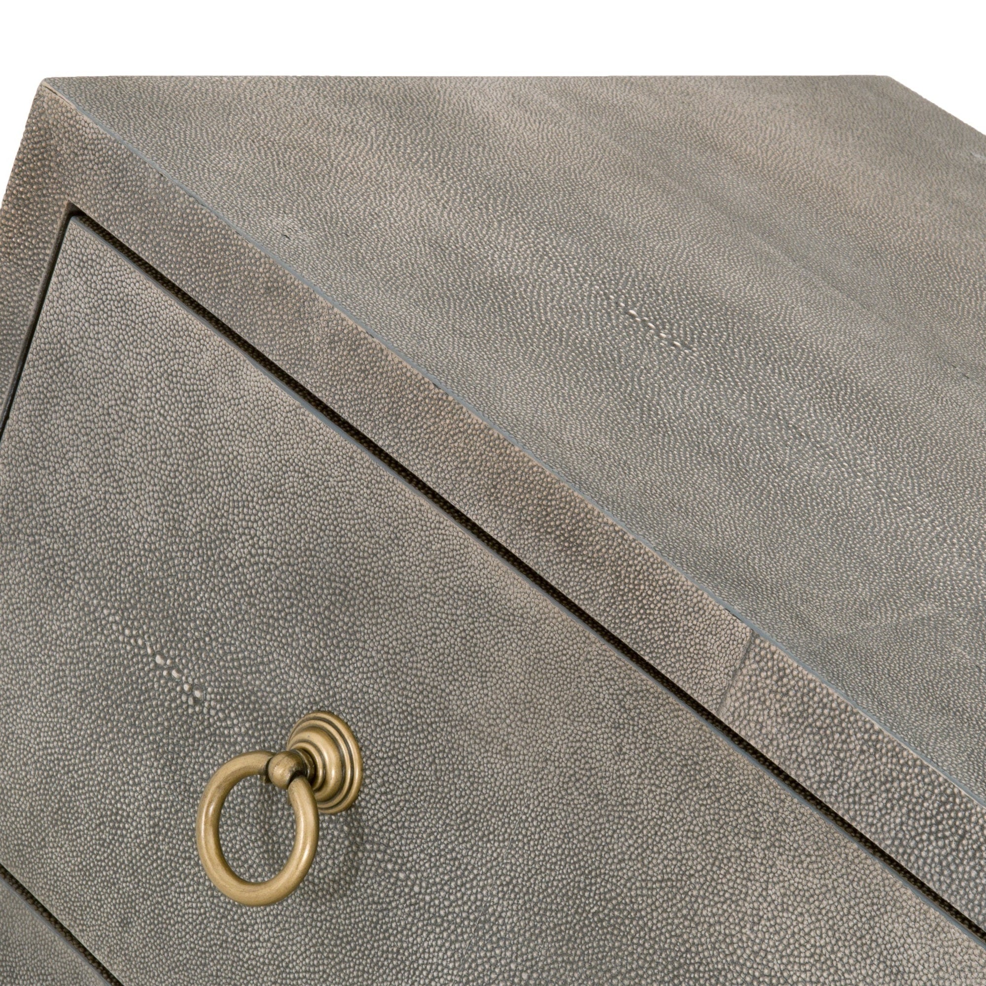 Close-up of pearl white faux shagreen textured dresser drawer with brushed gold ring pull by Essentials For Living