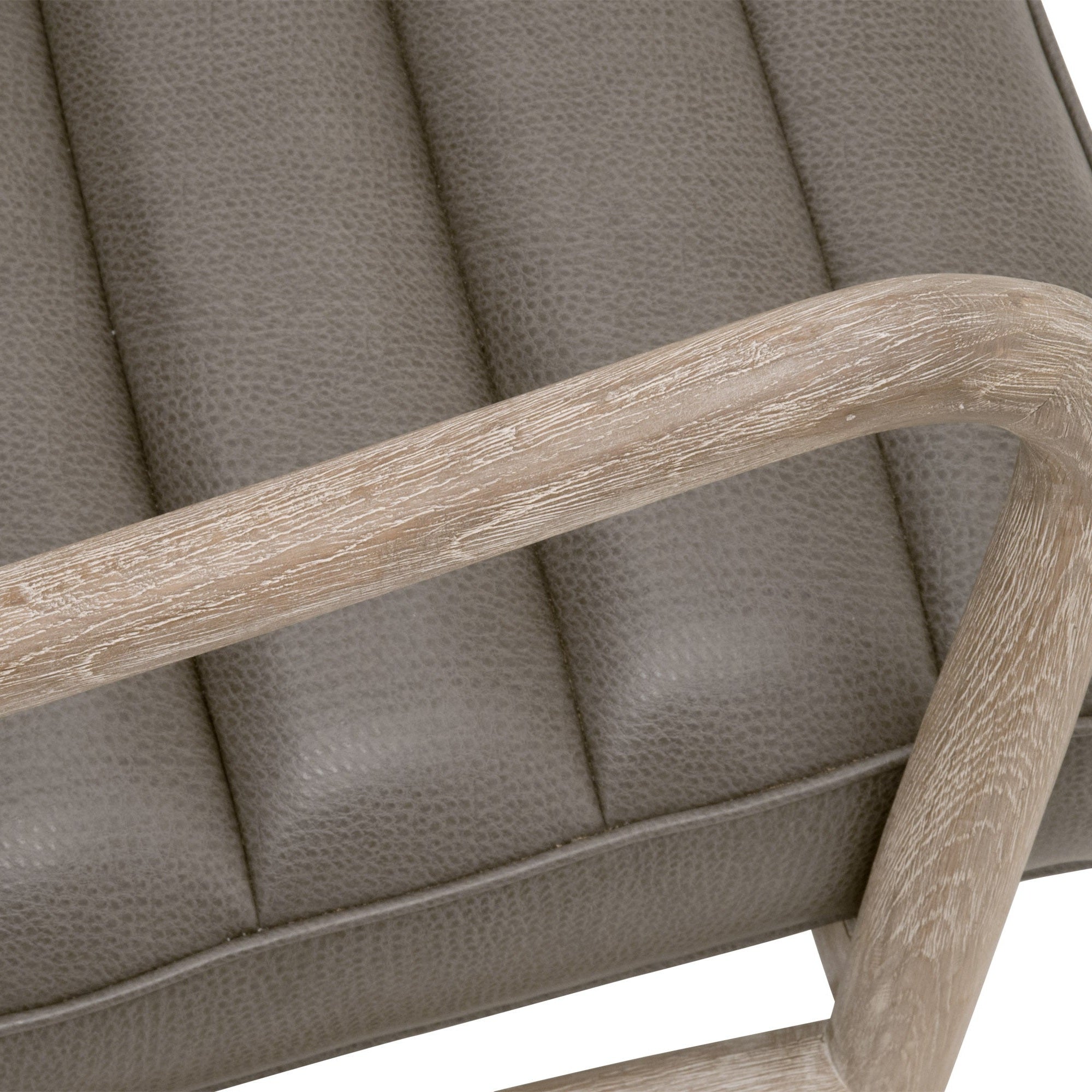 Close-up of Tahoe Club Chair showing gray synthetic leather upholstery and natural gray oak frame armrest details